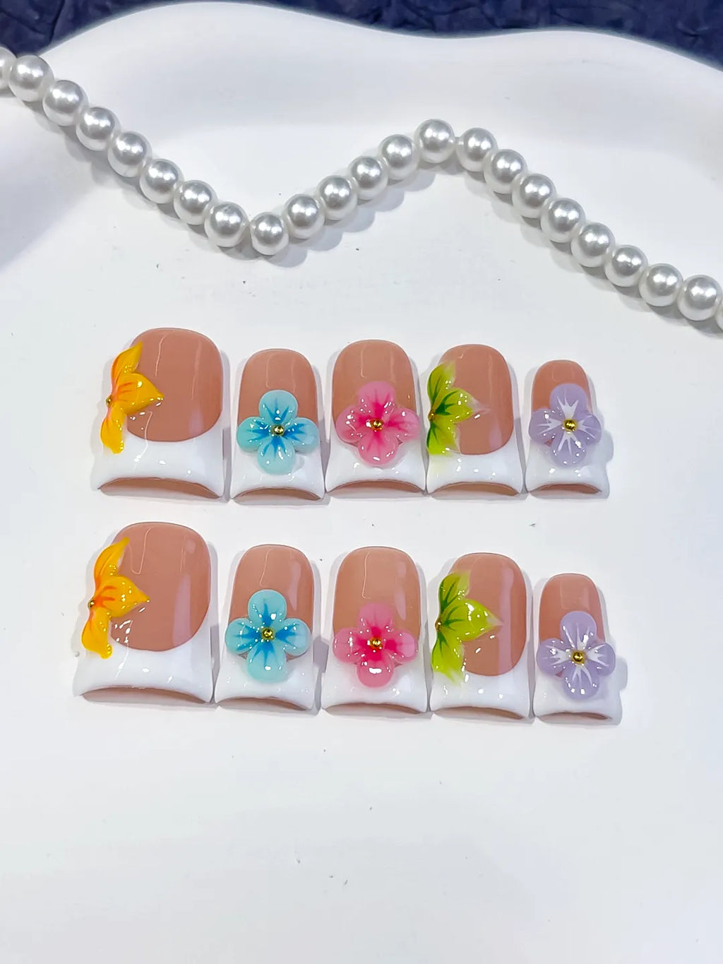 Nude Orange Blue Green Abstract Flower 3D press on nails close up