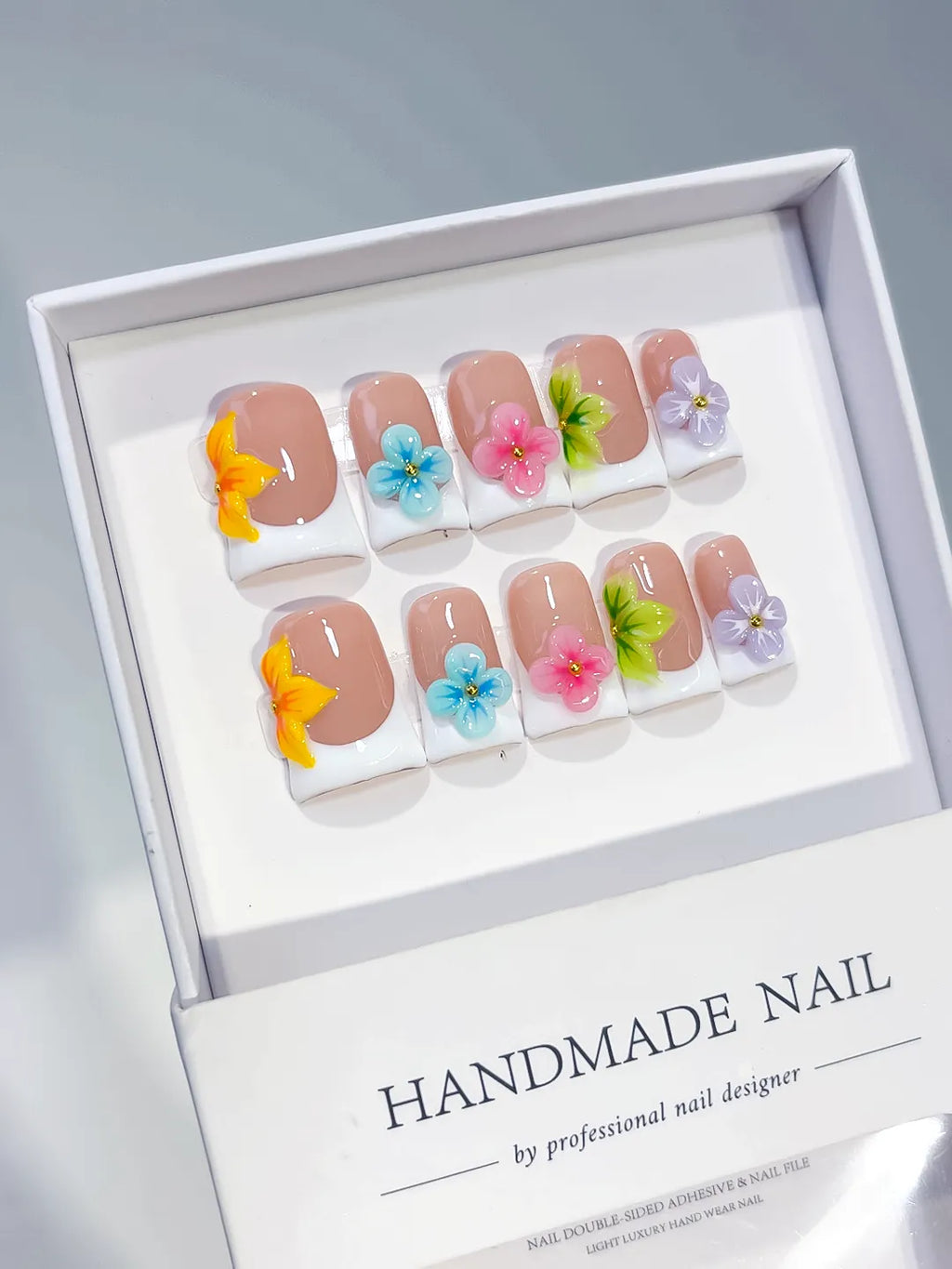 Nude Orange Blue Green Abstract Flower 3D press on nails angled view