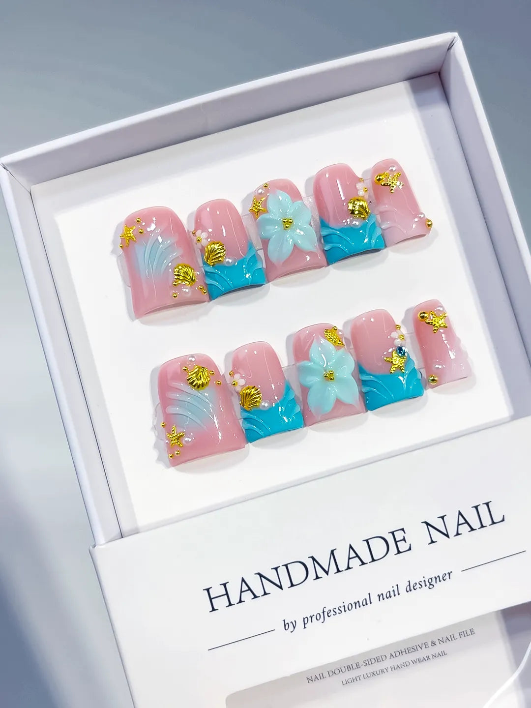 Pink Blue White Gold French tip Flower Rhinestone 3D press on nails angled view