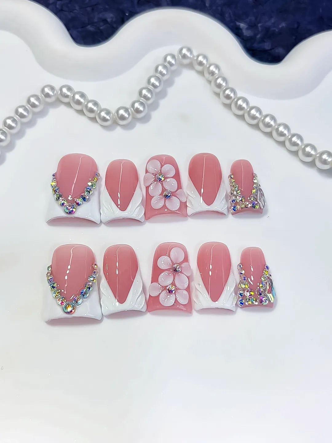 Pink White Silver French tip Flower Rhinestone press on nails close up