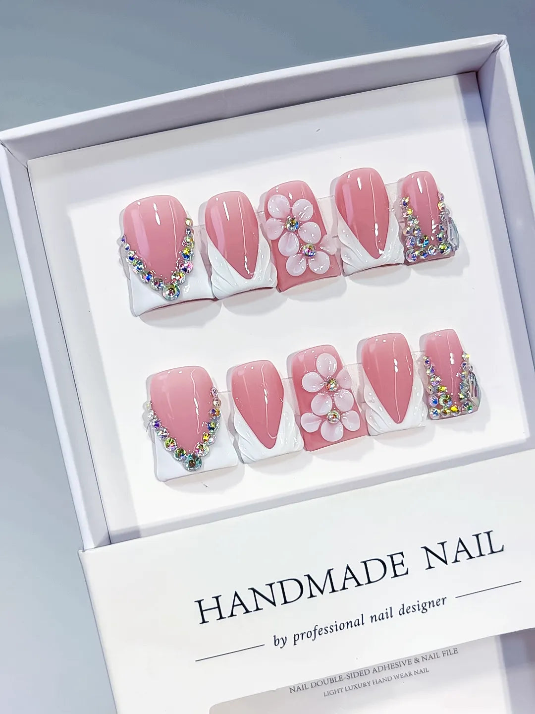 Pink White Silver French tip Flower Rhinestone press on nails angled view