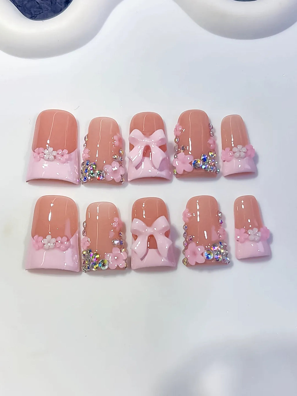 Nude Pink White Gold French tip Flower Bow Rhinestone 3D press on nails detail view