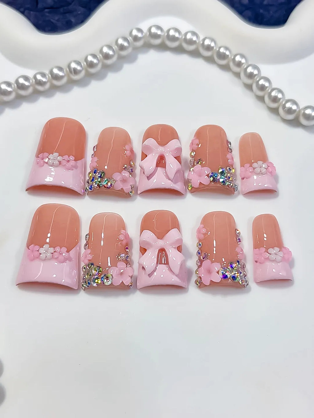 Nude Pink White Gold French tip Flower Bow Rhinestone 3D press on nails detail view