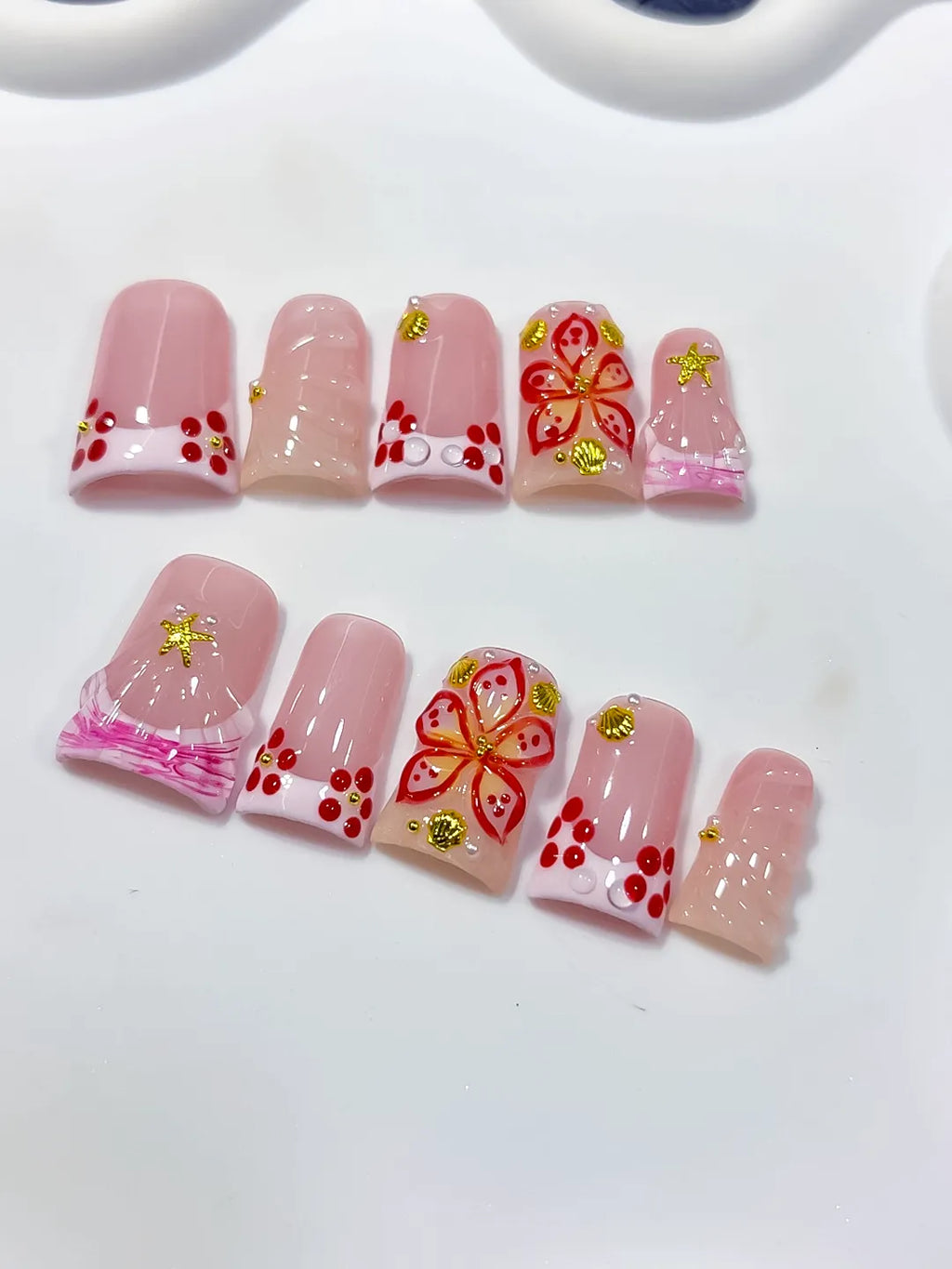 Pink White Gold Red French tip Butterfly Starfish 3D press on nails close up