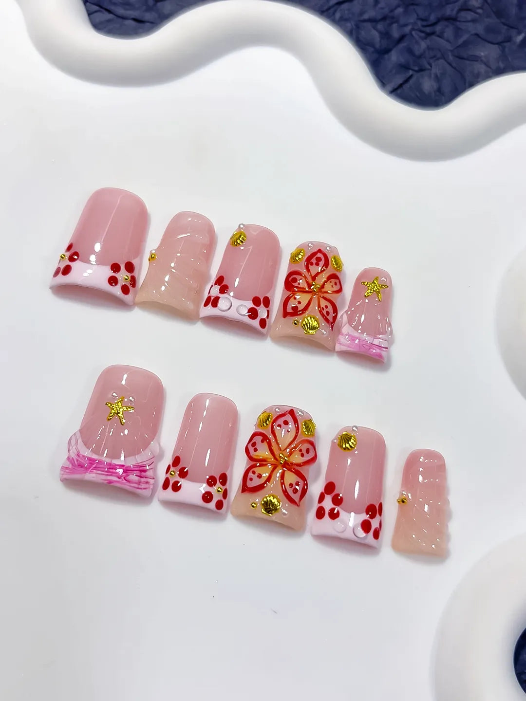 Pink White Gold Red French tip Butterfly Starfish 3D press on nails detail view