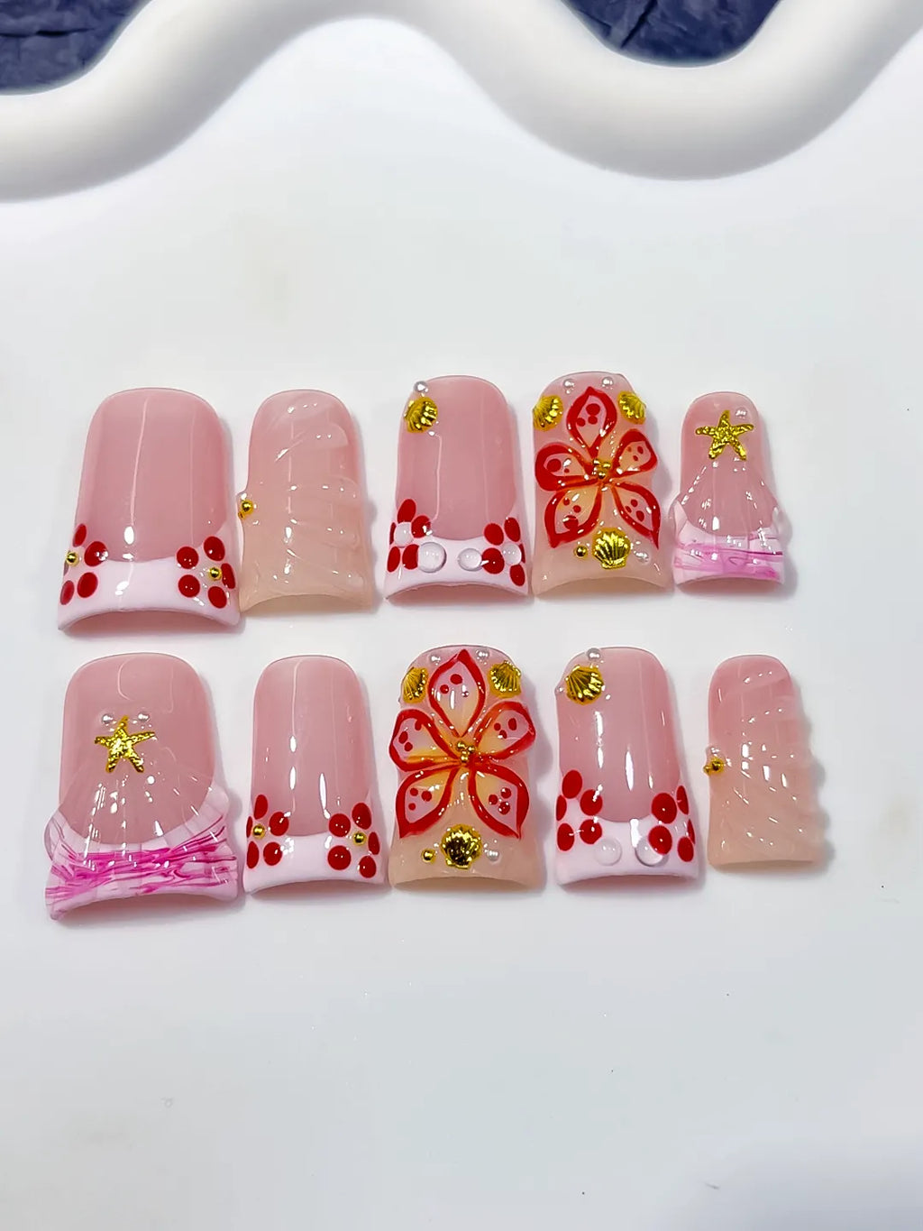 Pink White Gold Red French tip Butterfly Starfish 3D press on nails detail view
