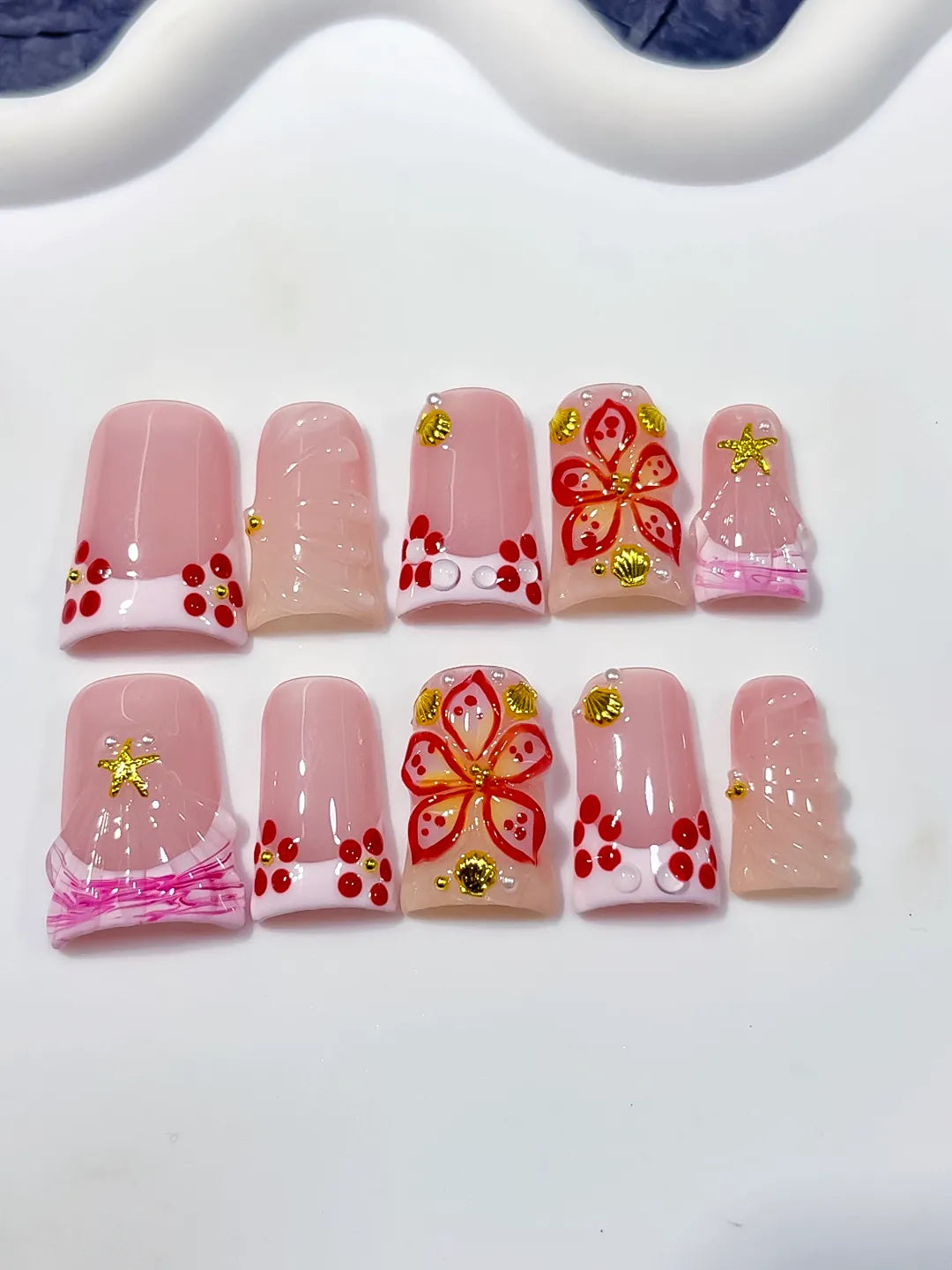 Pink White Gold Red French tip Butterfly Starfish 3D press on nails detail view