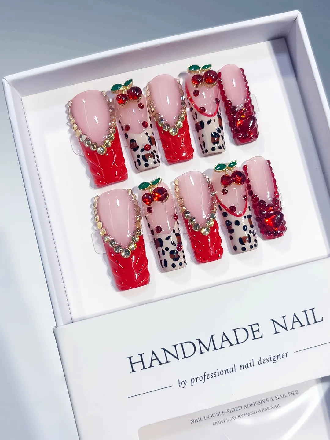 Red Pink White Green Silver Abstract Bow Cherry Heart Animal Print Rhinestone 3D press on nails angled view