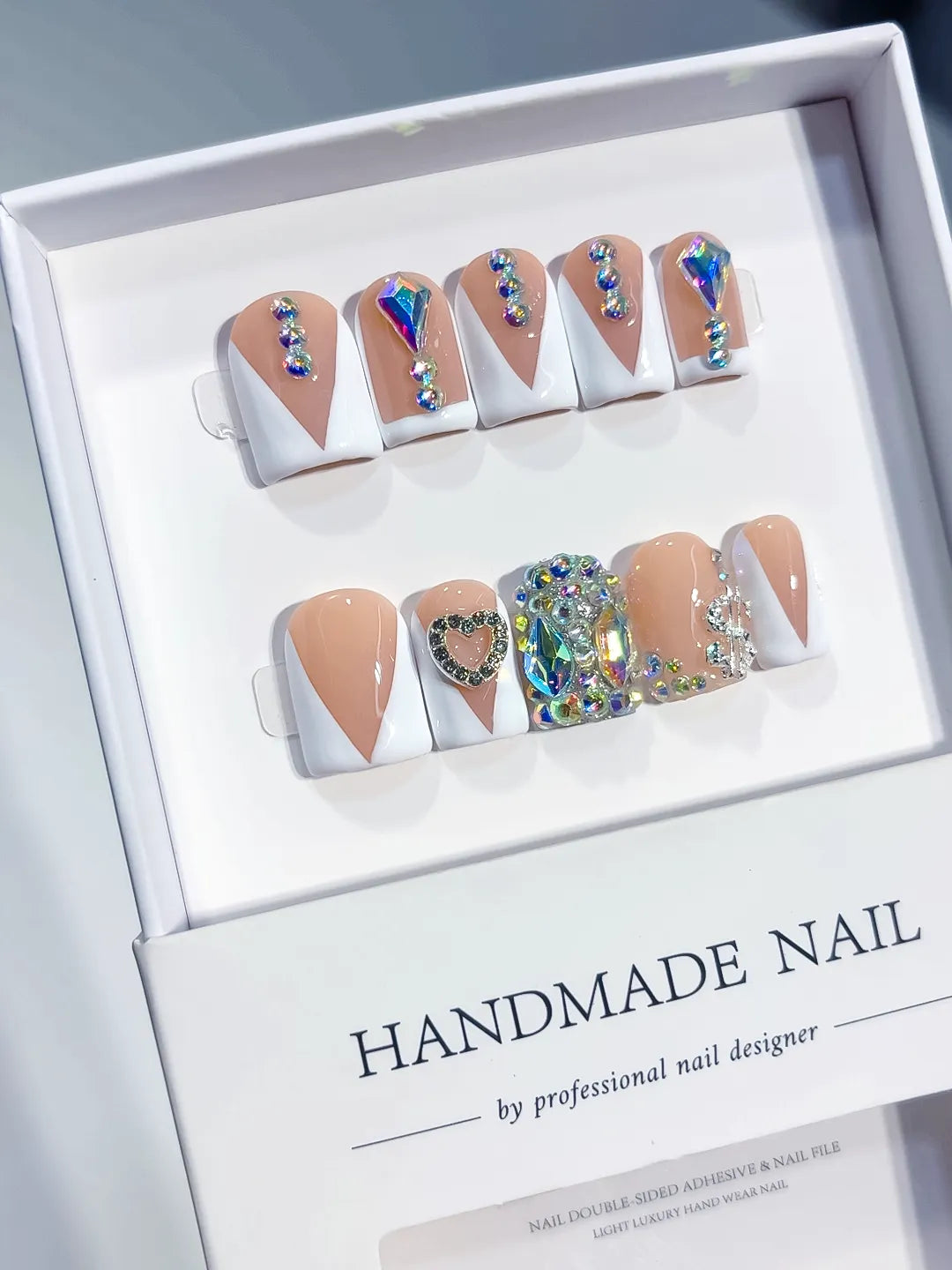 Nude White Blue Silver French tip Rhinestone press on nails angled view