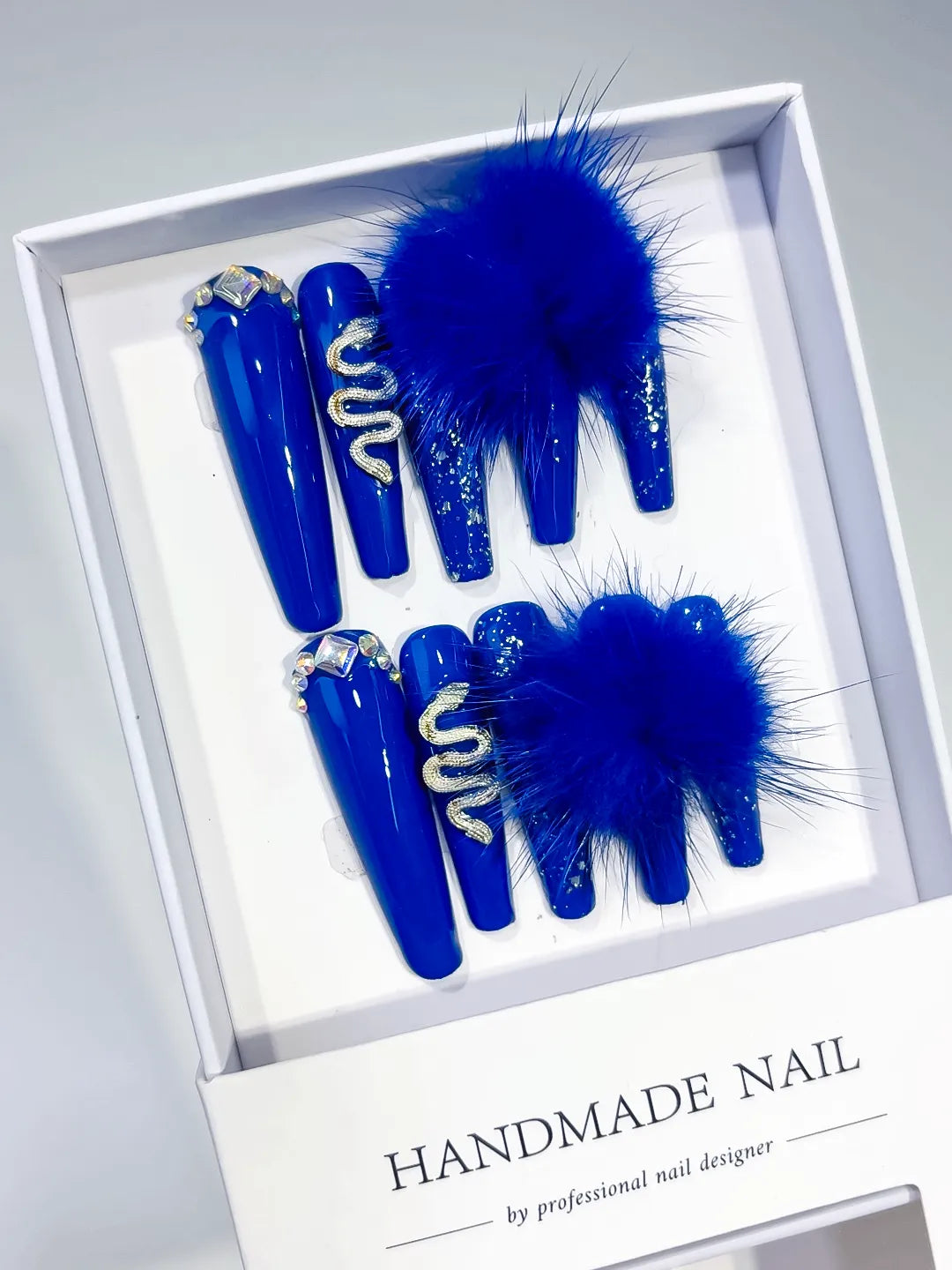 Blue Silver Solid color Bear Rhinestone 3D press on nails angled view