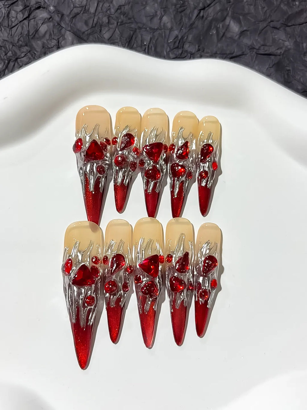 Red White Gold Abstract Bow Metallic Accent press on nails close up