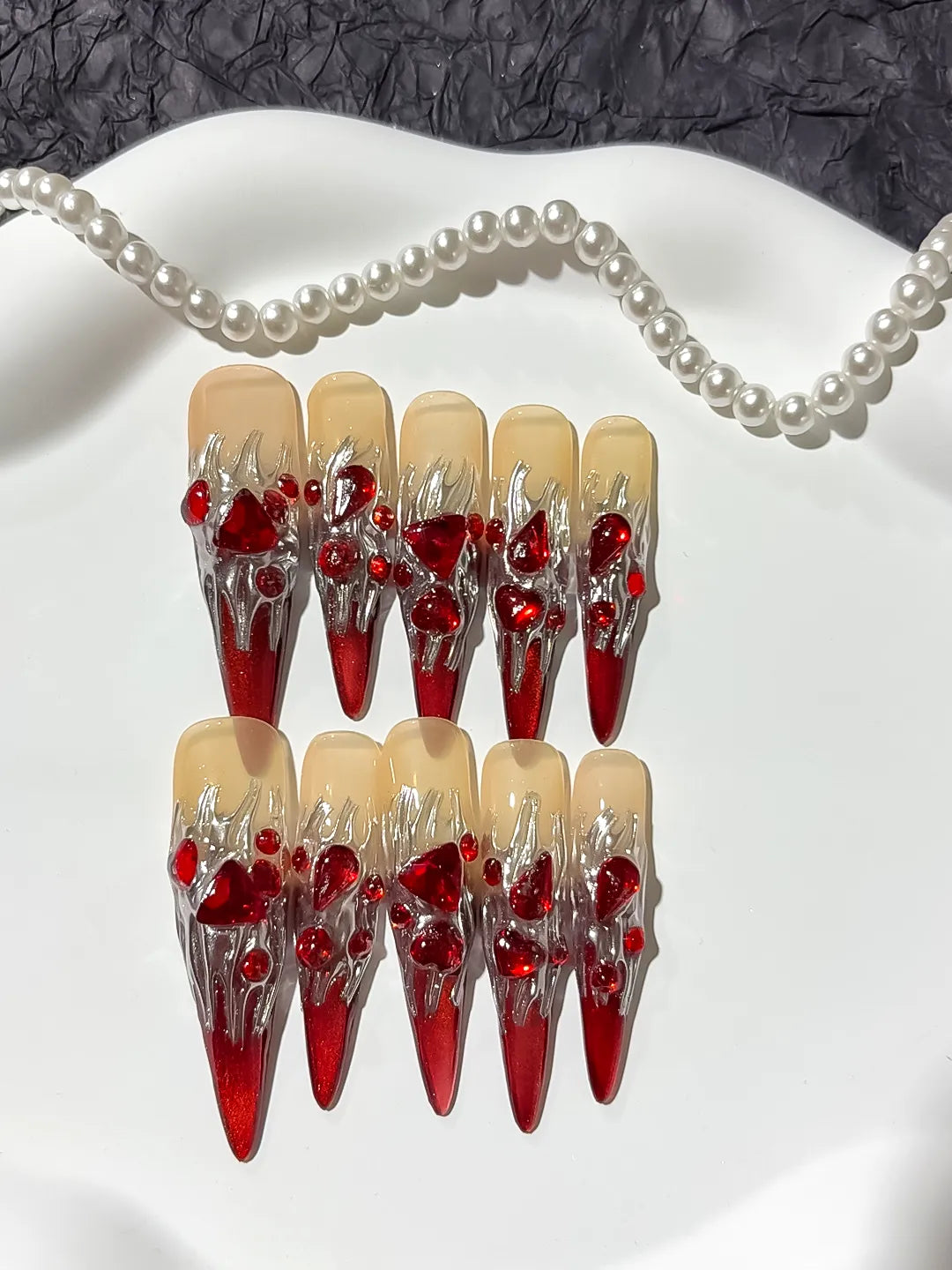 Red White Gold Abstract Bow Metallic Accent press on nails detail view