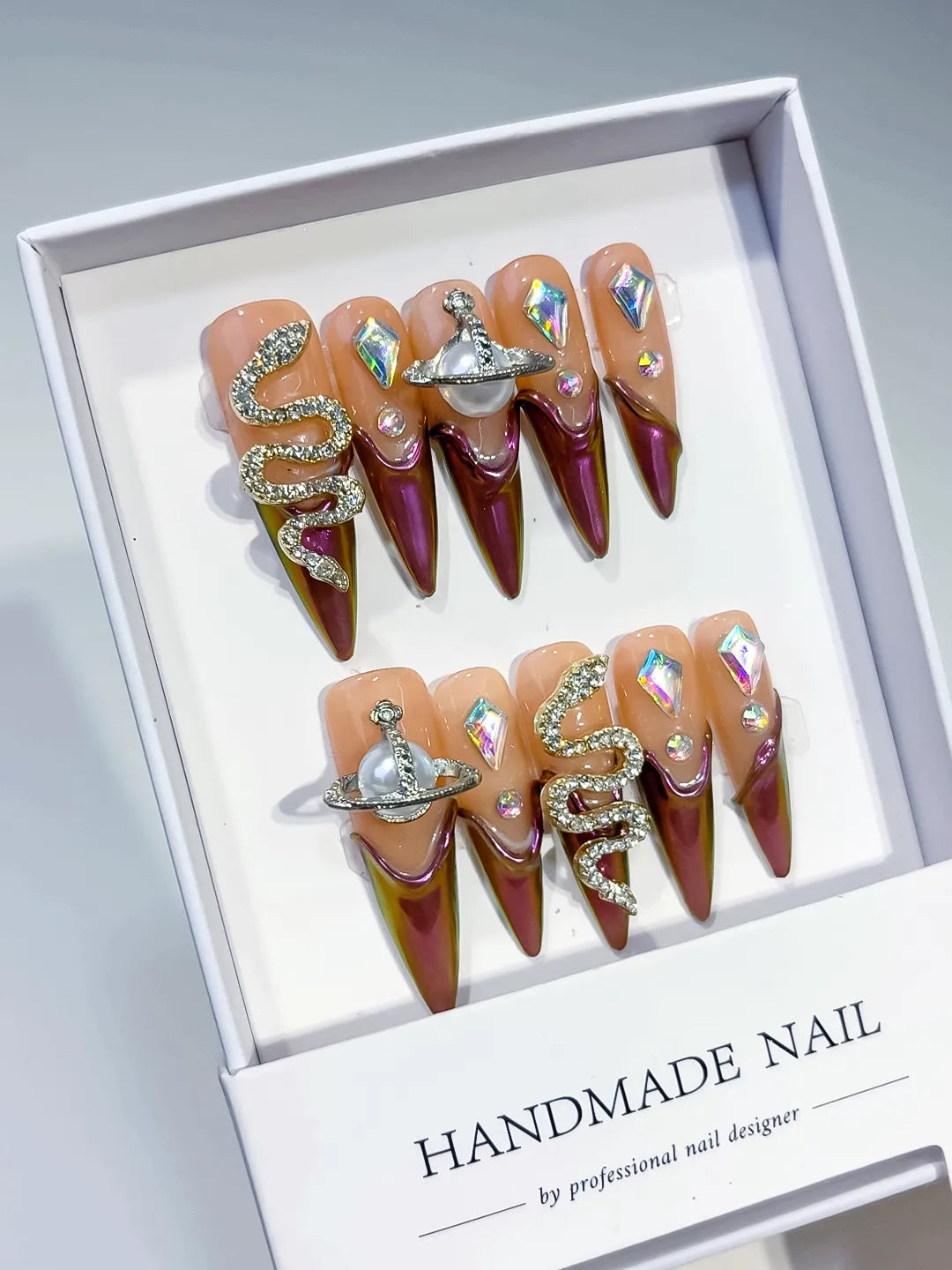 Brown Nude Gold Abstract Animal Print Metallic Accent press on nails angled view
