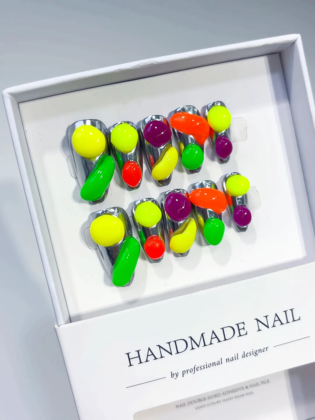Green Red Yellow Black Abstract Fruit 3D press on nails angled view