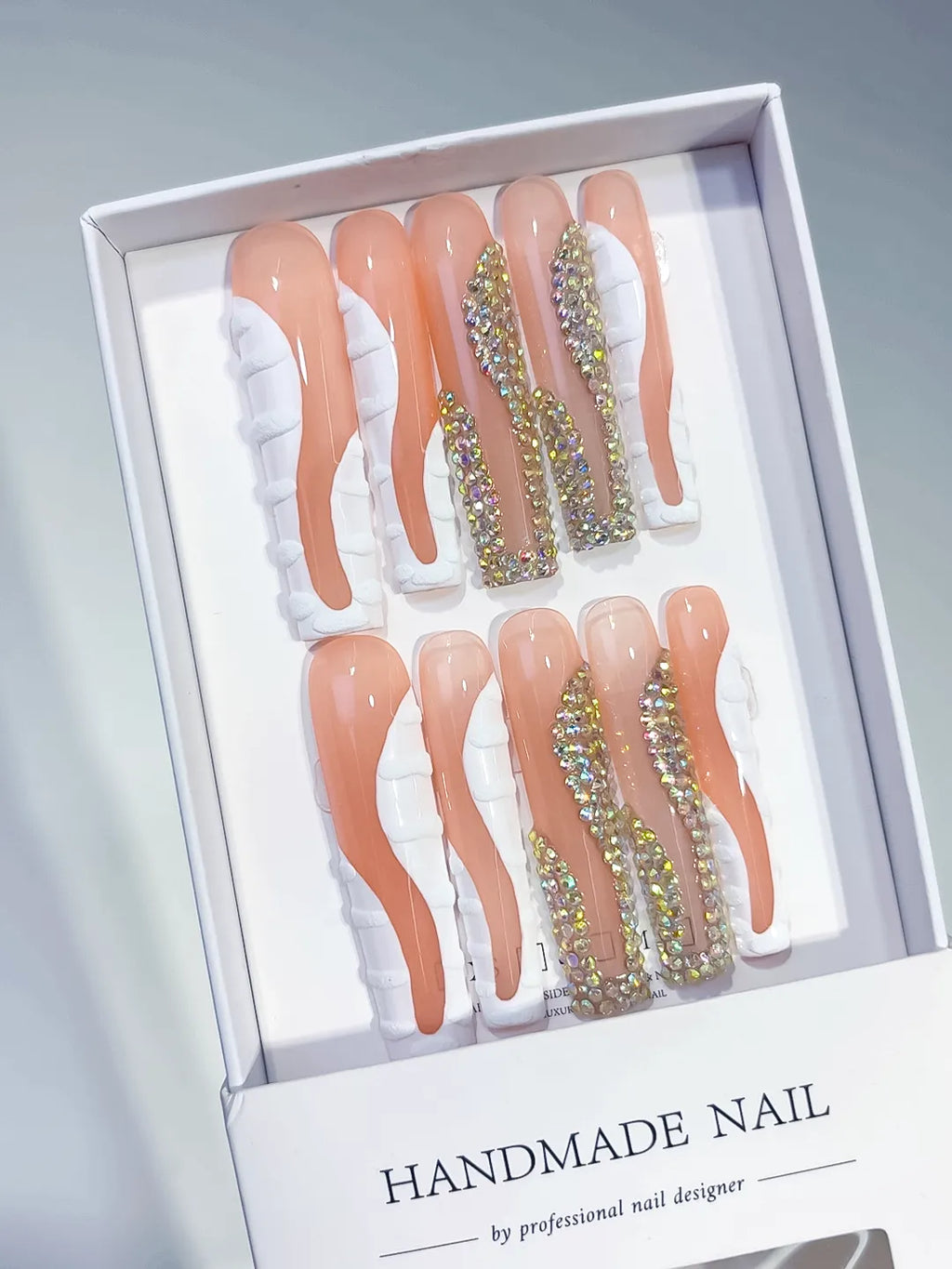 Nude Abstract Swirl press on nails angled view