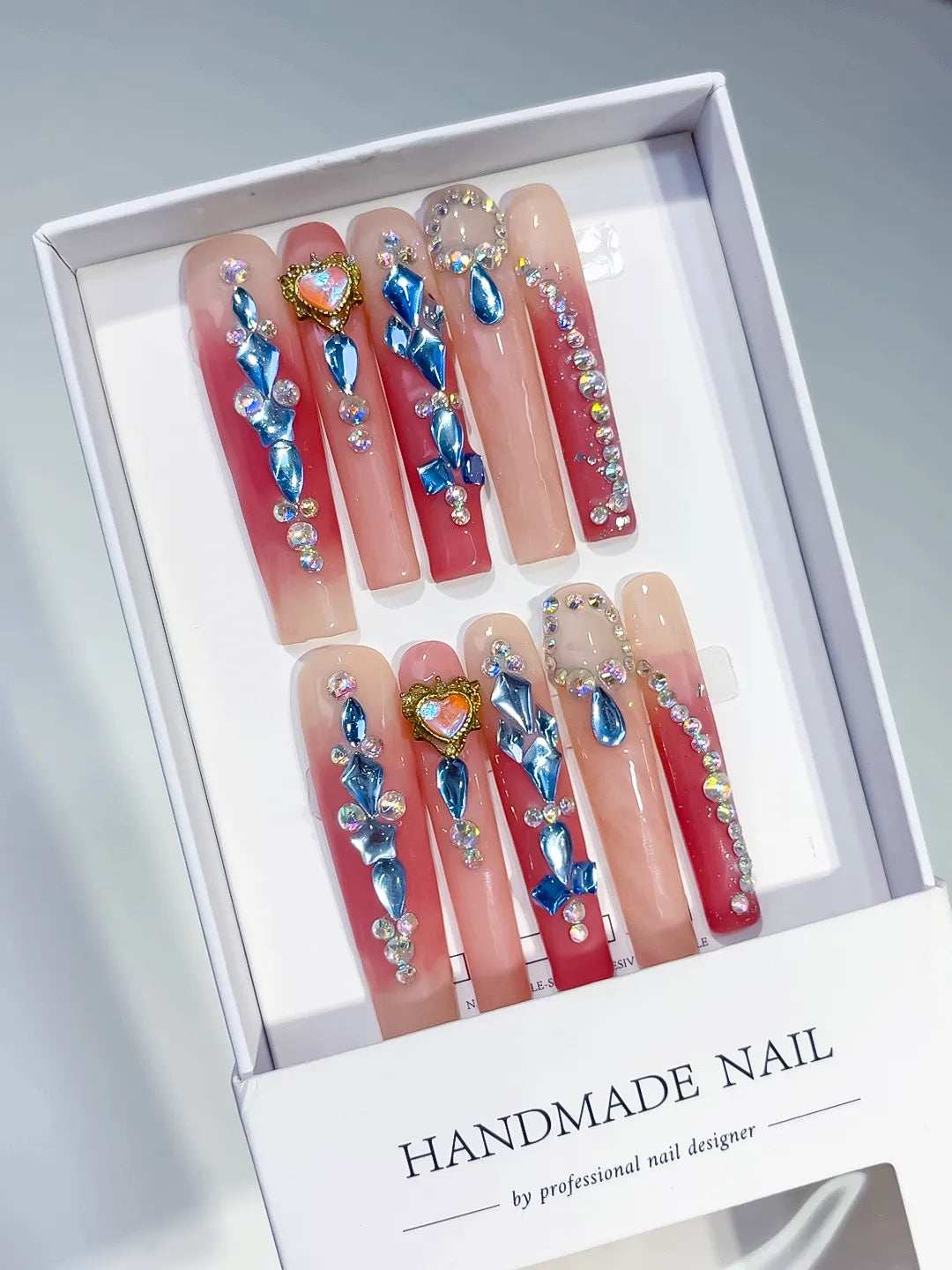 Pink Blue Orange Silver Abstract Star Rhinestone press on nails angled view