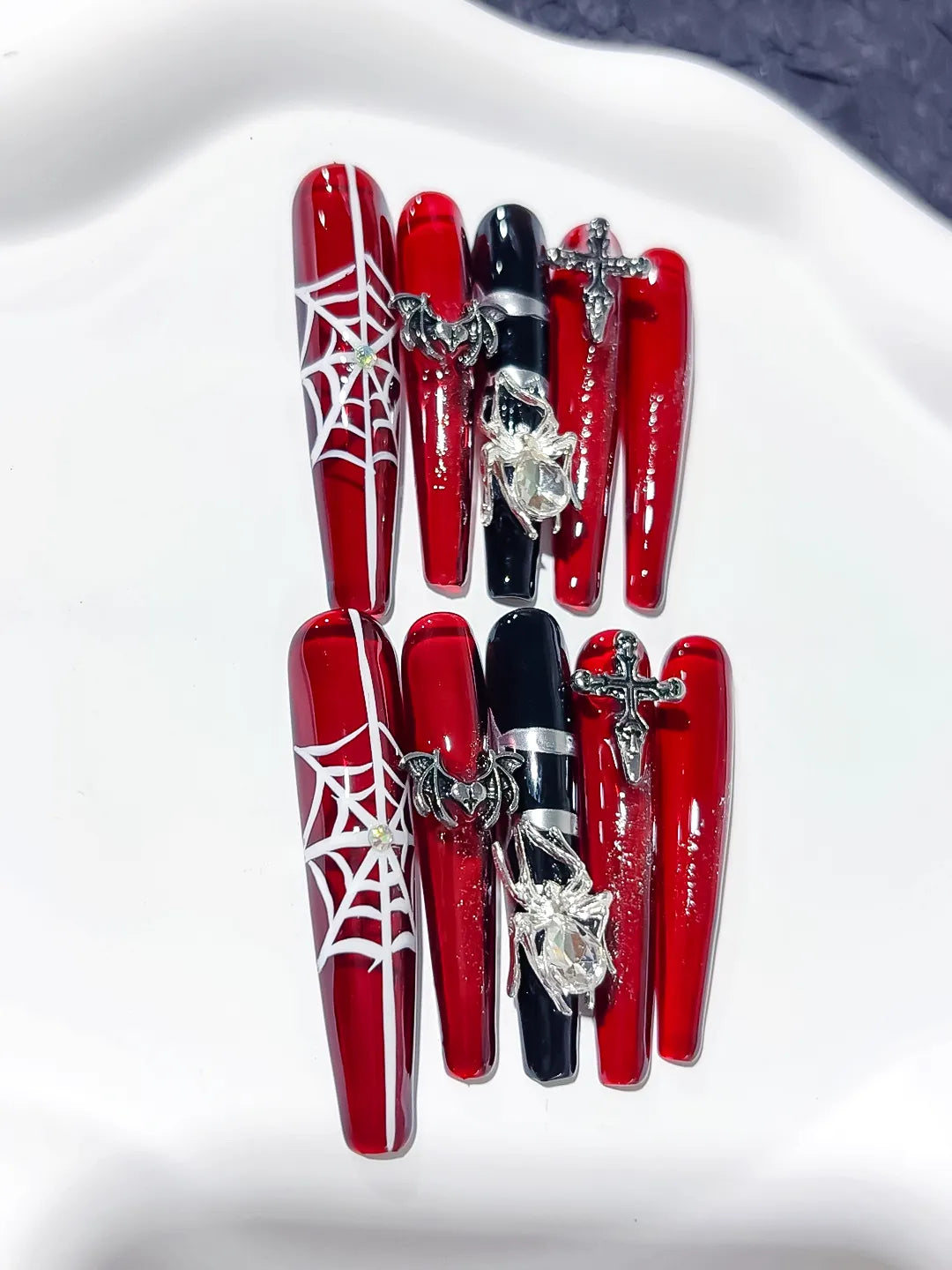 Red Black Silver Abstract Strap Stud Metallic Accent press on nails close up