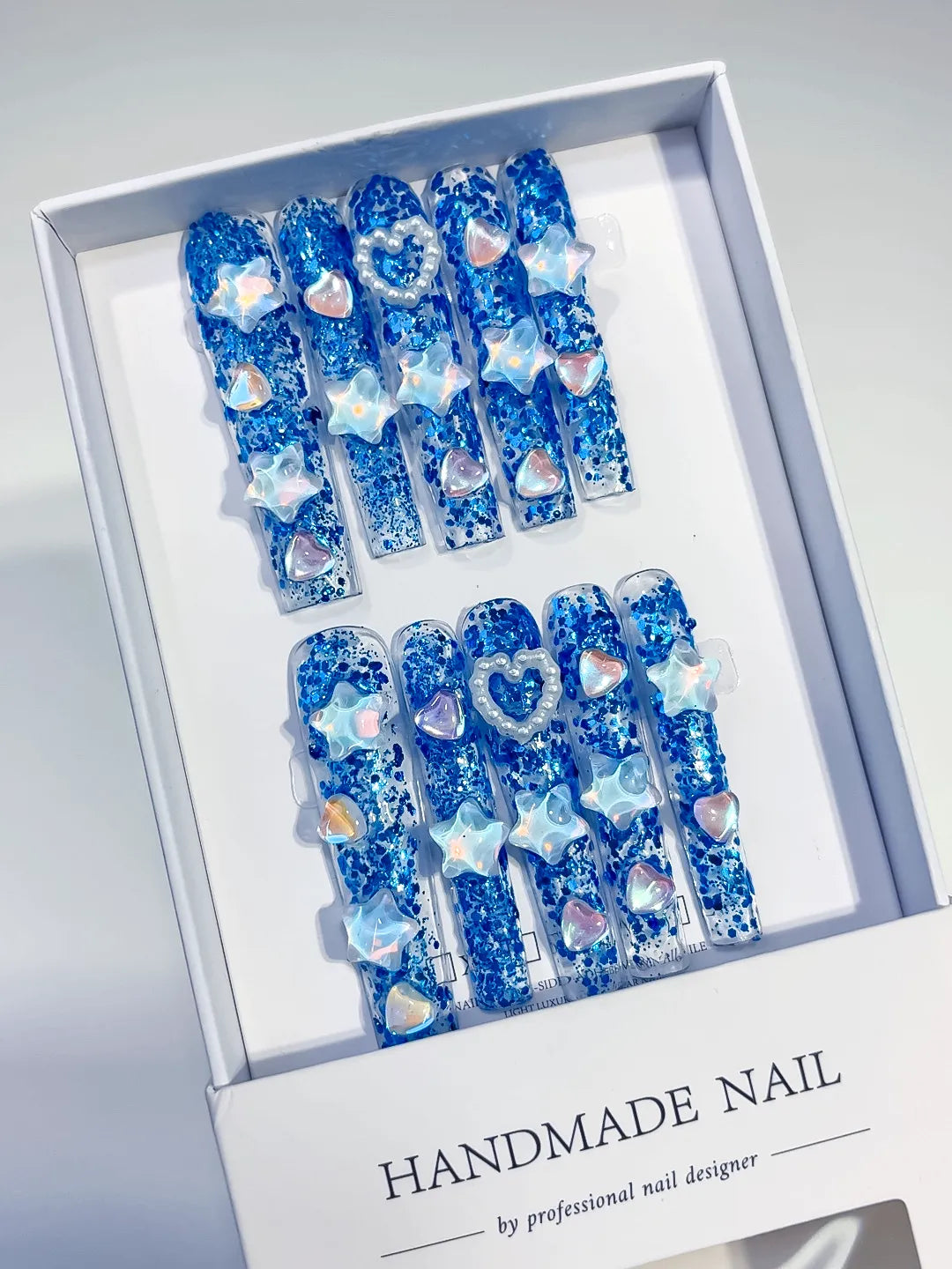 Blue White Abstract Flower 3D press on nails angled view