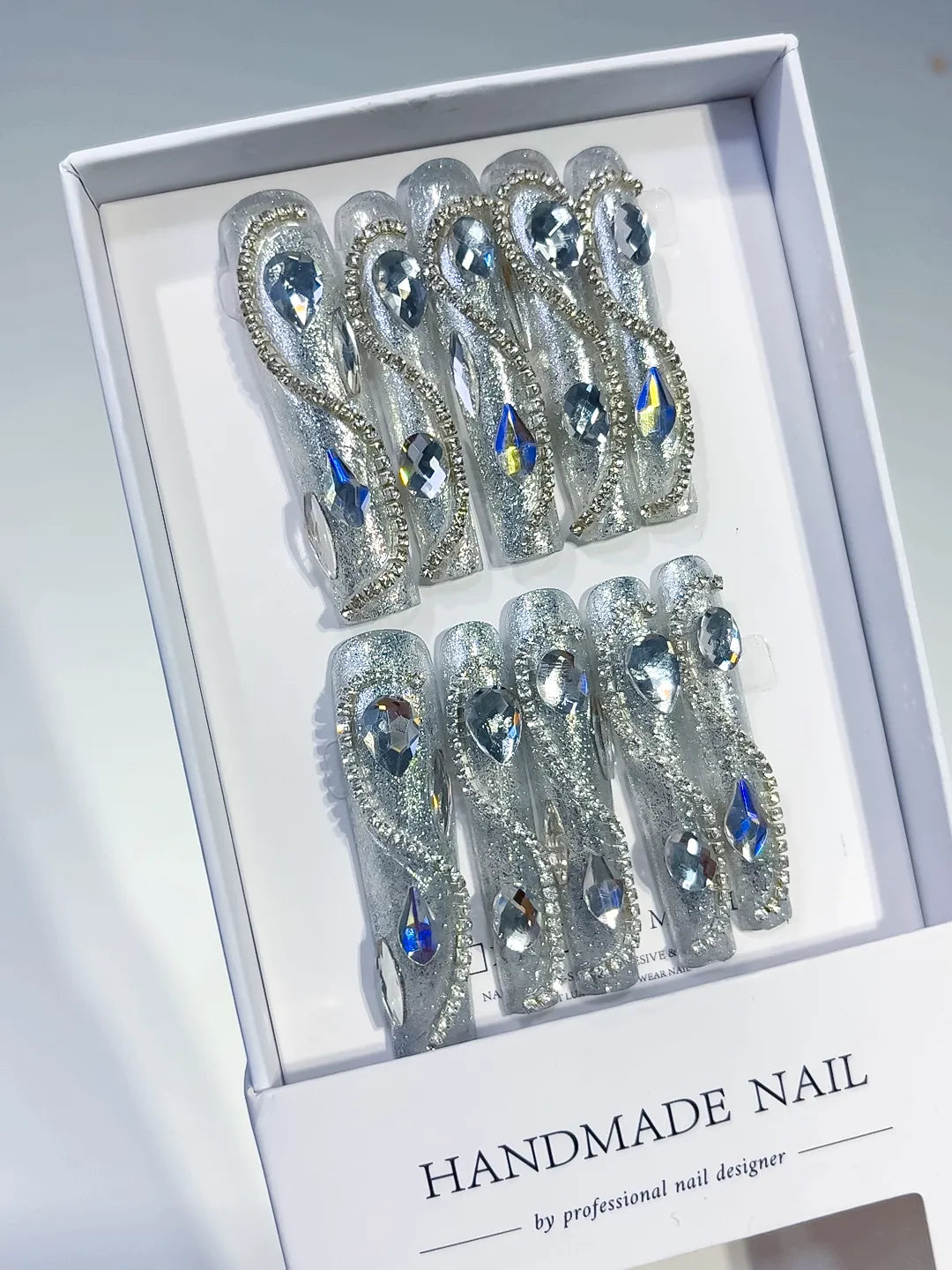 Silver Solid color Rhinestone Crystal Cluster press on nails angled view