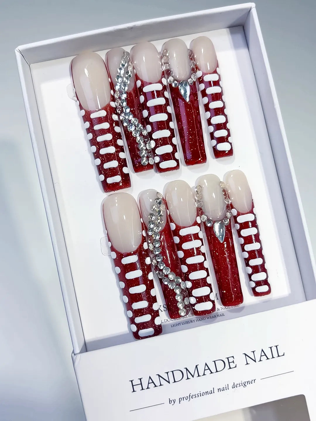 White Brown Abstract Swirl press on nails angled view