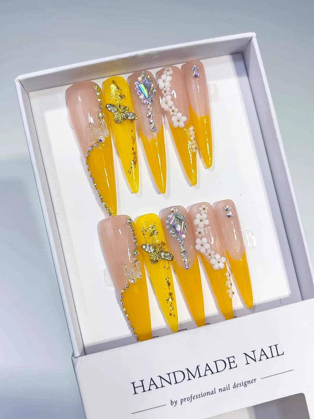 Yellow Solid color press on nails angled view