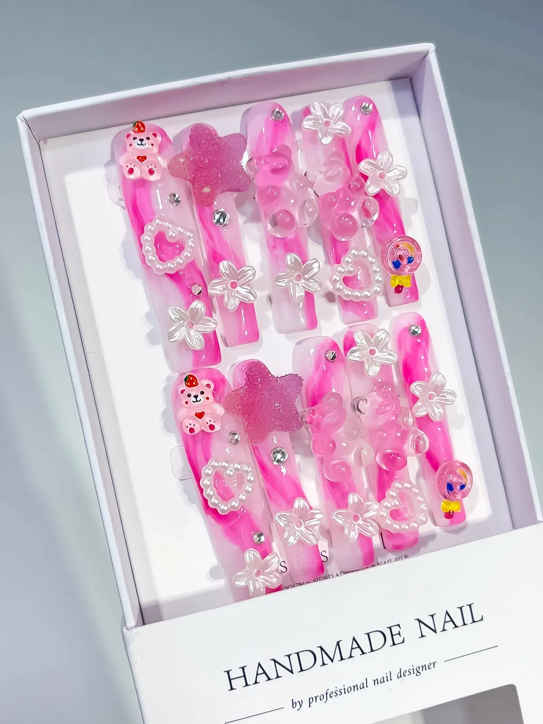 Pink White Solid color Flower 3D press on nails angled view