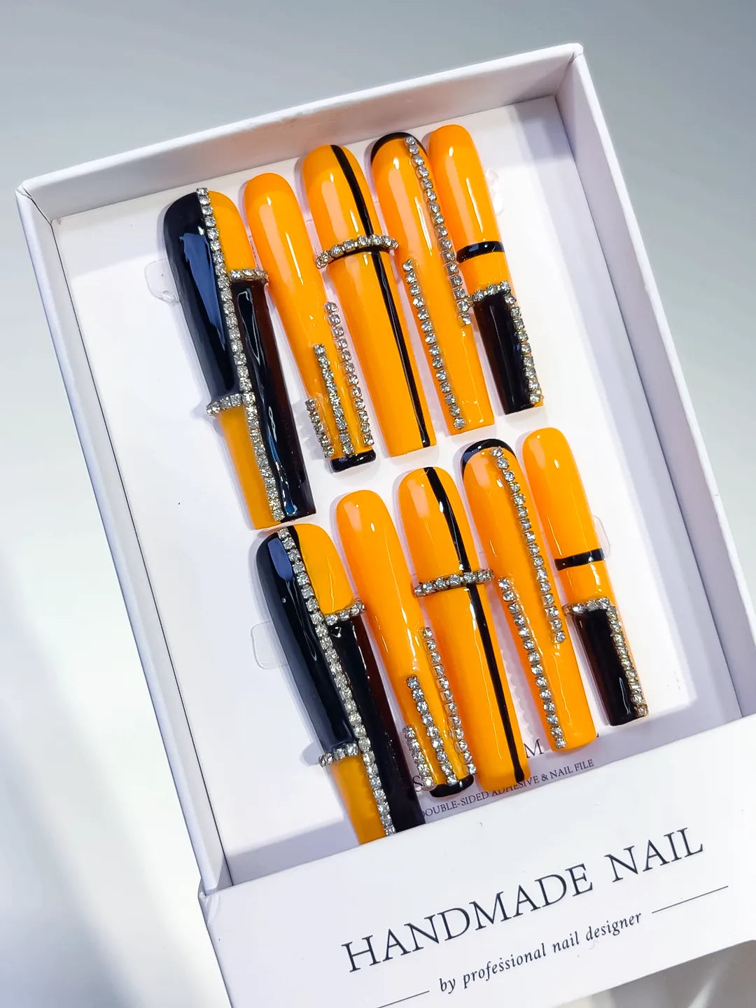 Yellow Black Abstract press on nails angled view