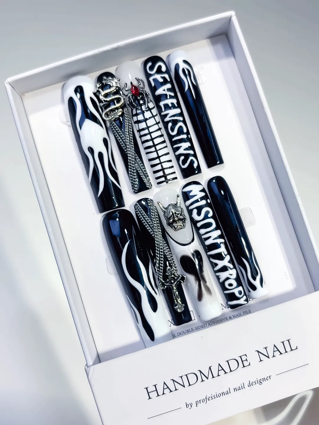 White Black Abstract Swirl 3D press on nails angled view