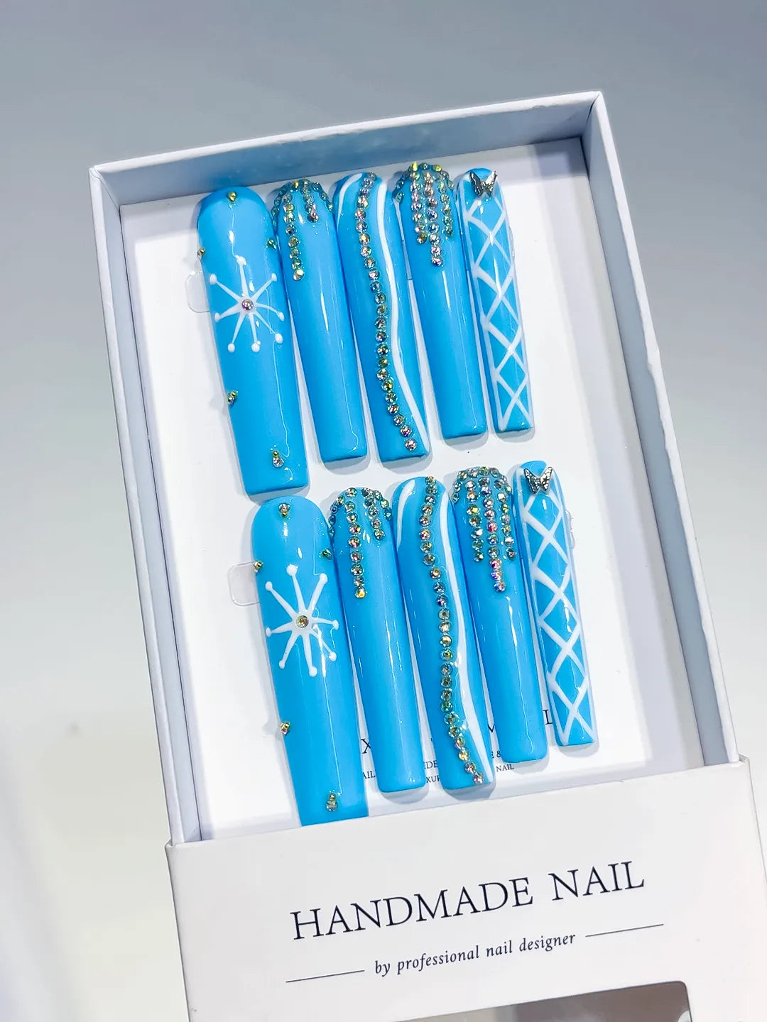 Blue Solid color press on nails angled view