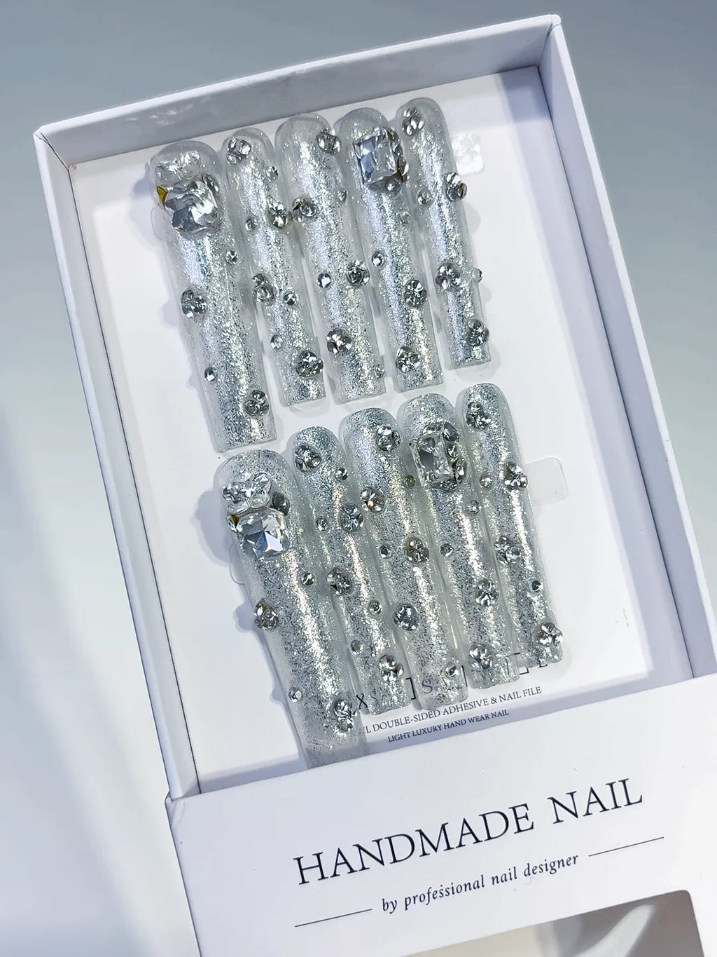 Silver Solid color Rhinestone Crystal Cluster press on nails angled view