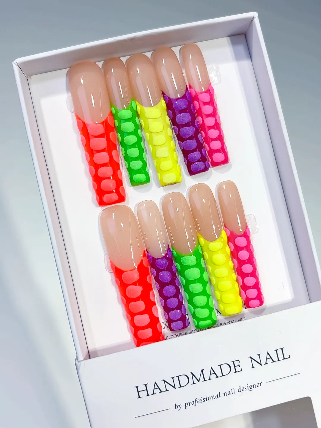 Red Orange Yellow Green Abstract press on nails angled view
