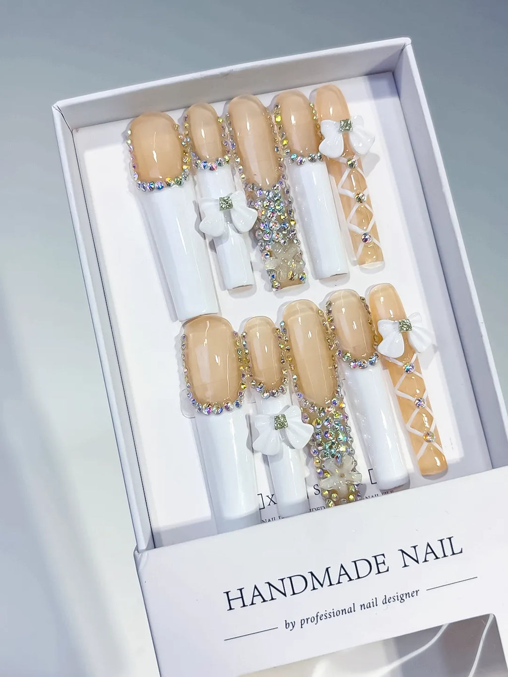 Nude White Gold Solid color Rhinestone Metallic Accent press on nails angled view