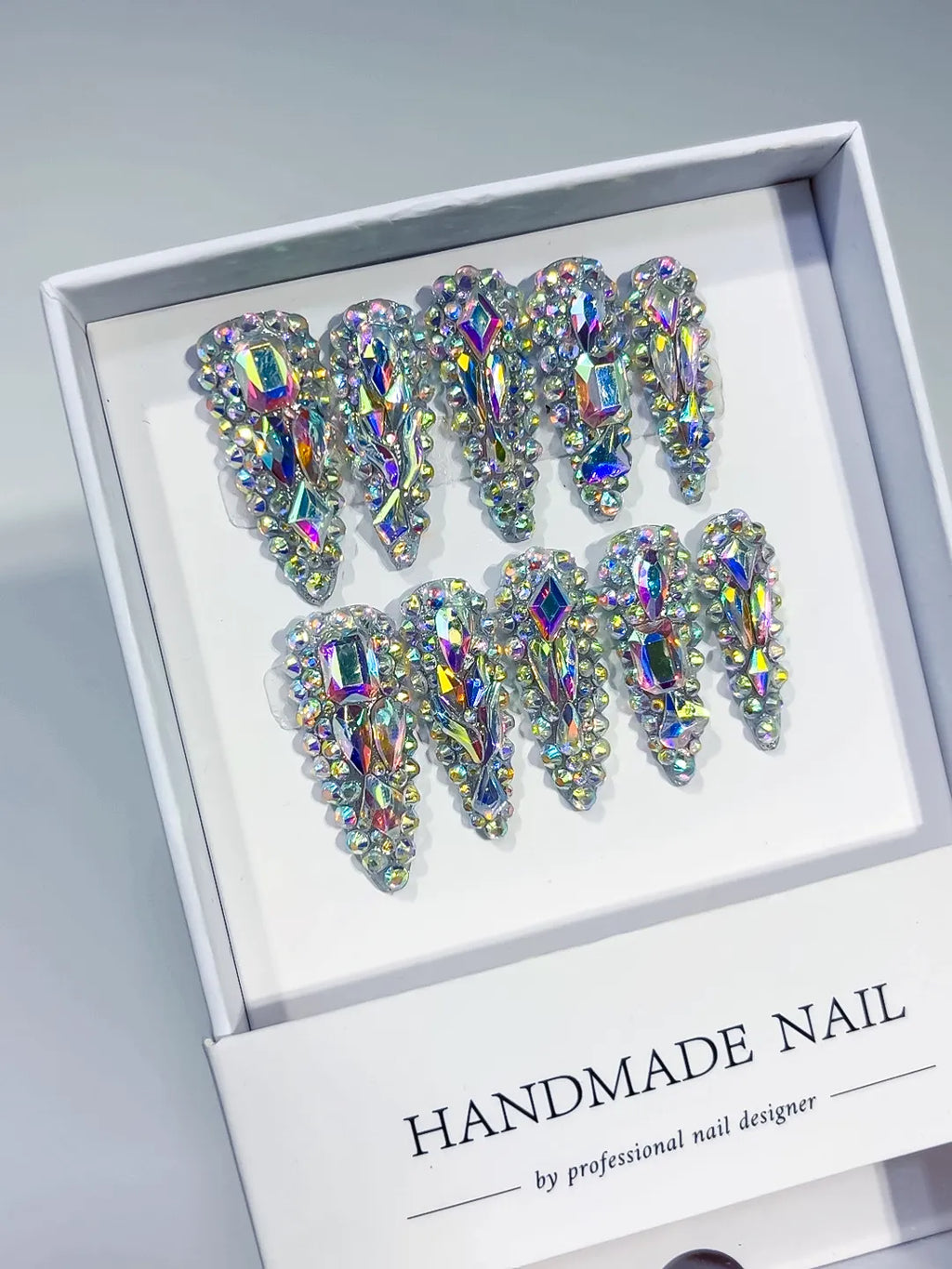 Silver Multicolor Solid color Rhinestone Crystal Cluster press on nails angled view