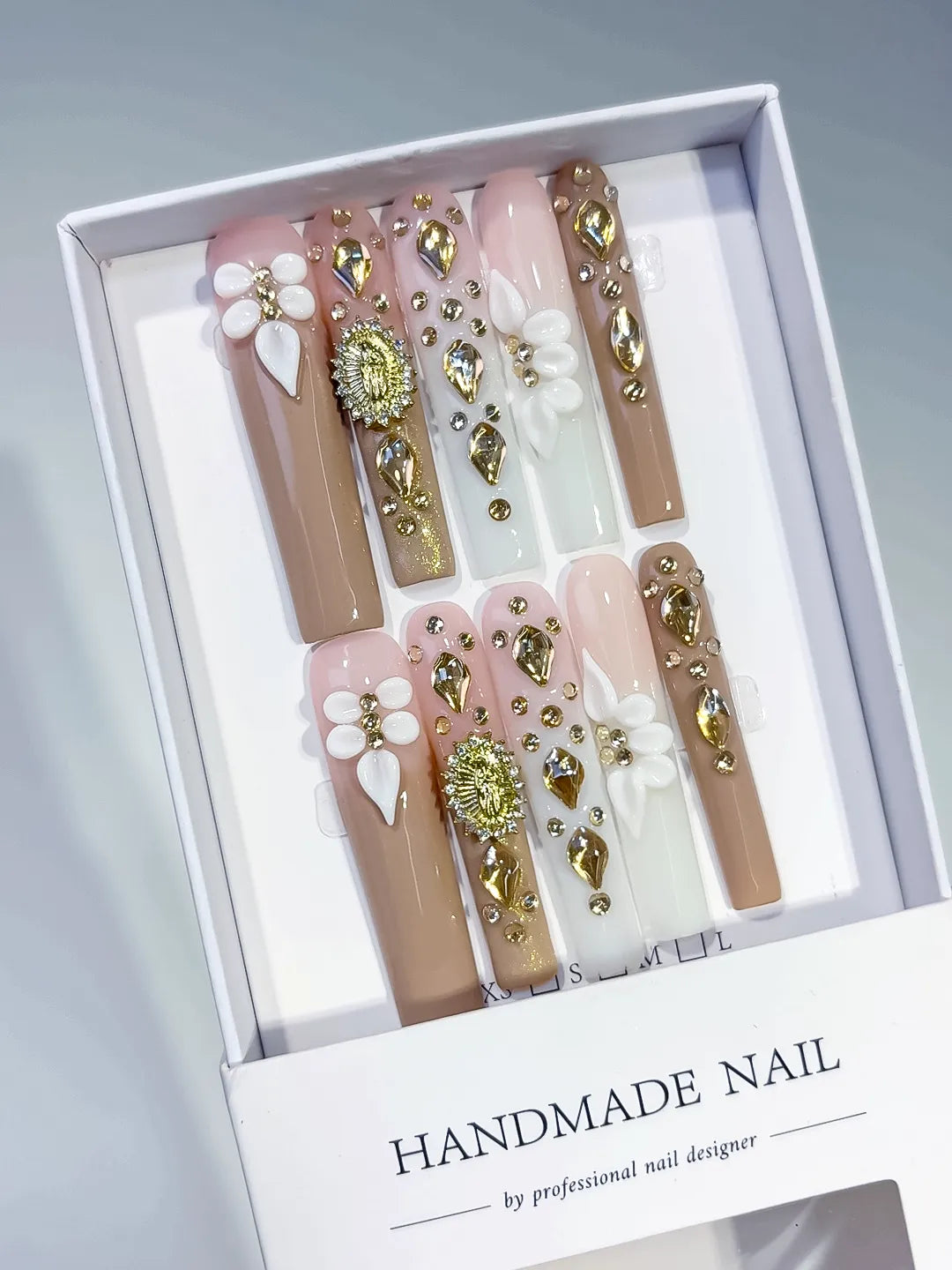 Nude White Gold Green Pink Solid color Flower Rhinestone Metallic Accent 3D press on nails angled view