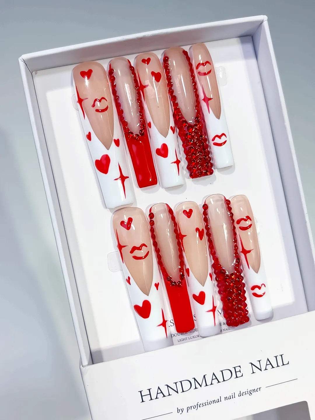 White Red French tip Bow Dot 3D press on nails angled view