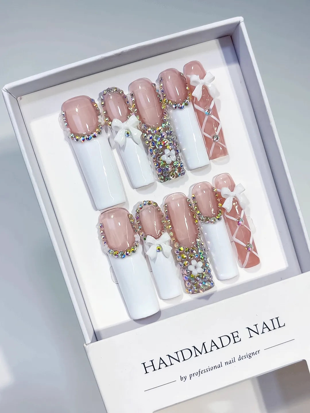 Nude White Pink Silver Solid color Heart Rhinestone 3D press on nails angled view