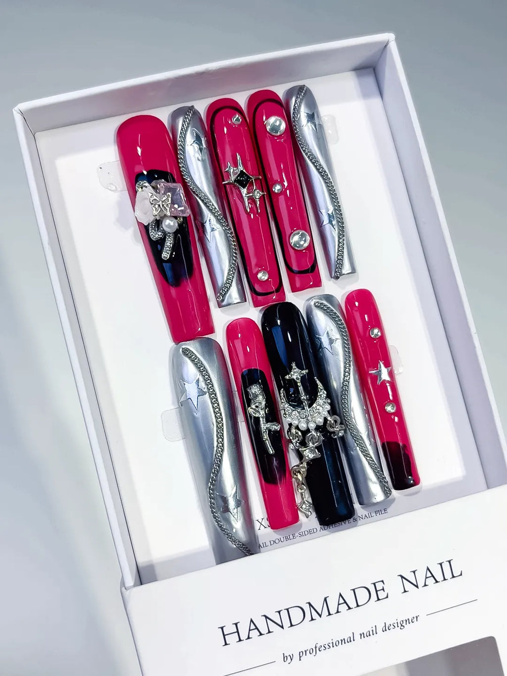 Pink Black Silver Abstract Heart Rhinestone Metallic Accent press on nails angled view
