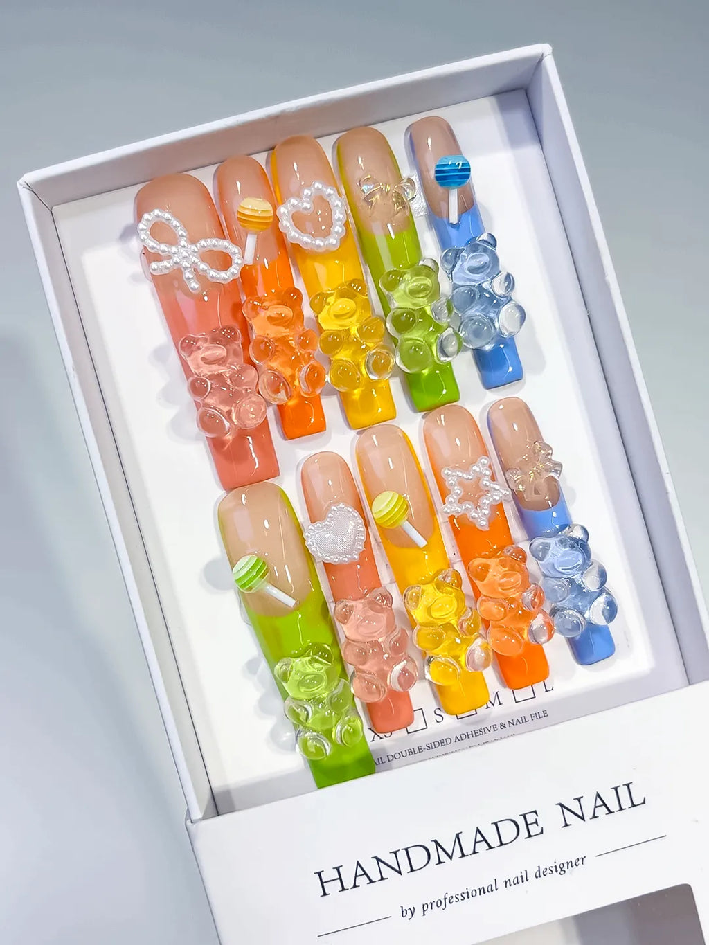 Orange Yellow White Glitter Ombre Glitter press on nails angled view
