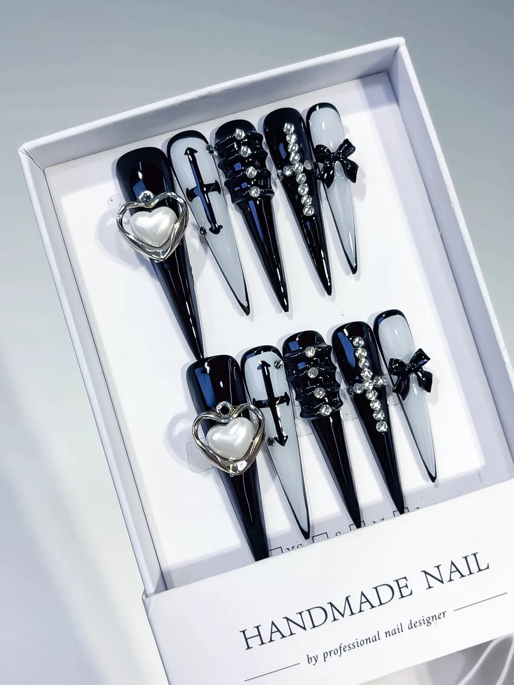 Black White Silver Abstract Bow Rhinestone 3D press on nails angled view