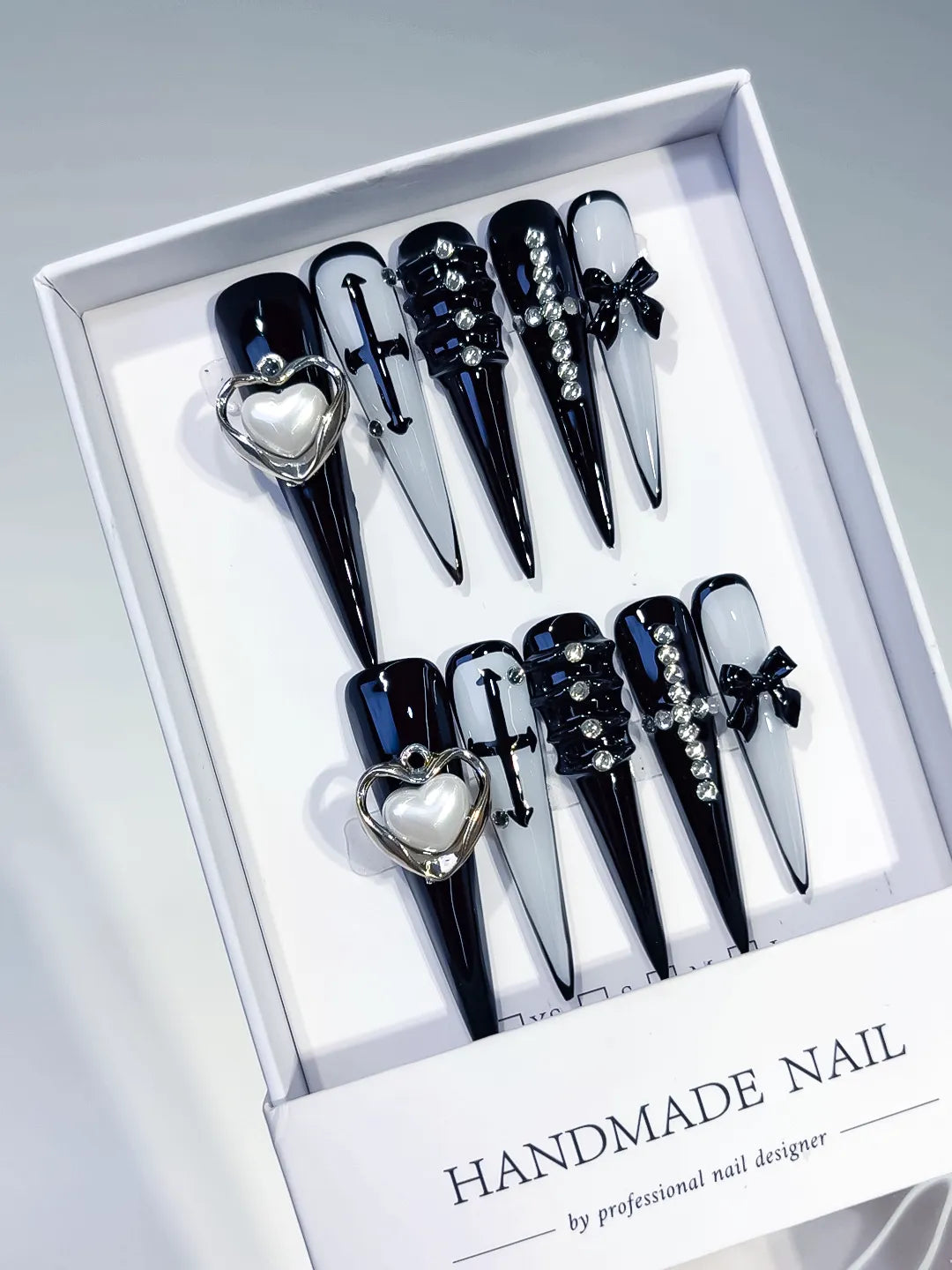 Black White Silver Abstract Bow Rhinestone 3D press on nails angled view