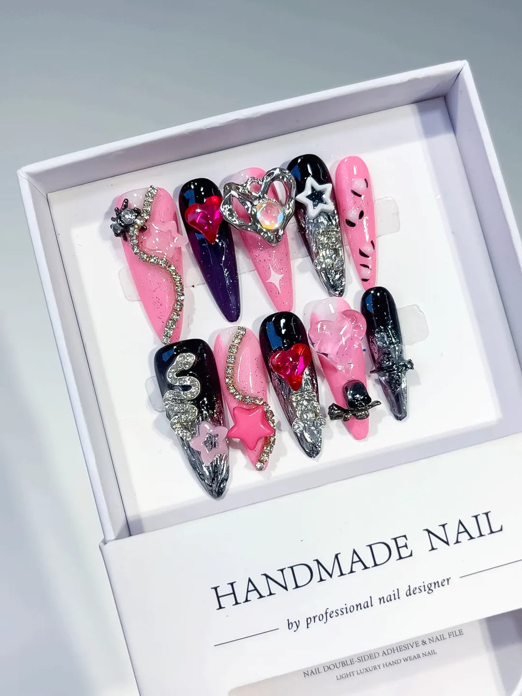 Pink Black Abstract Bow Flower 3D press on nails angled view