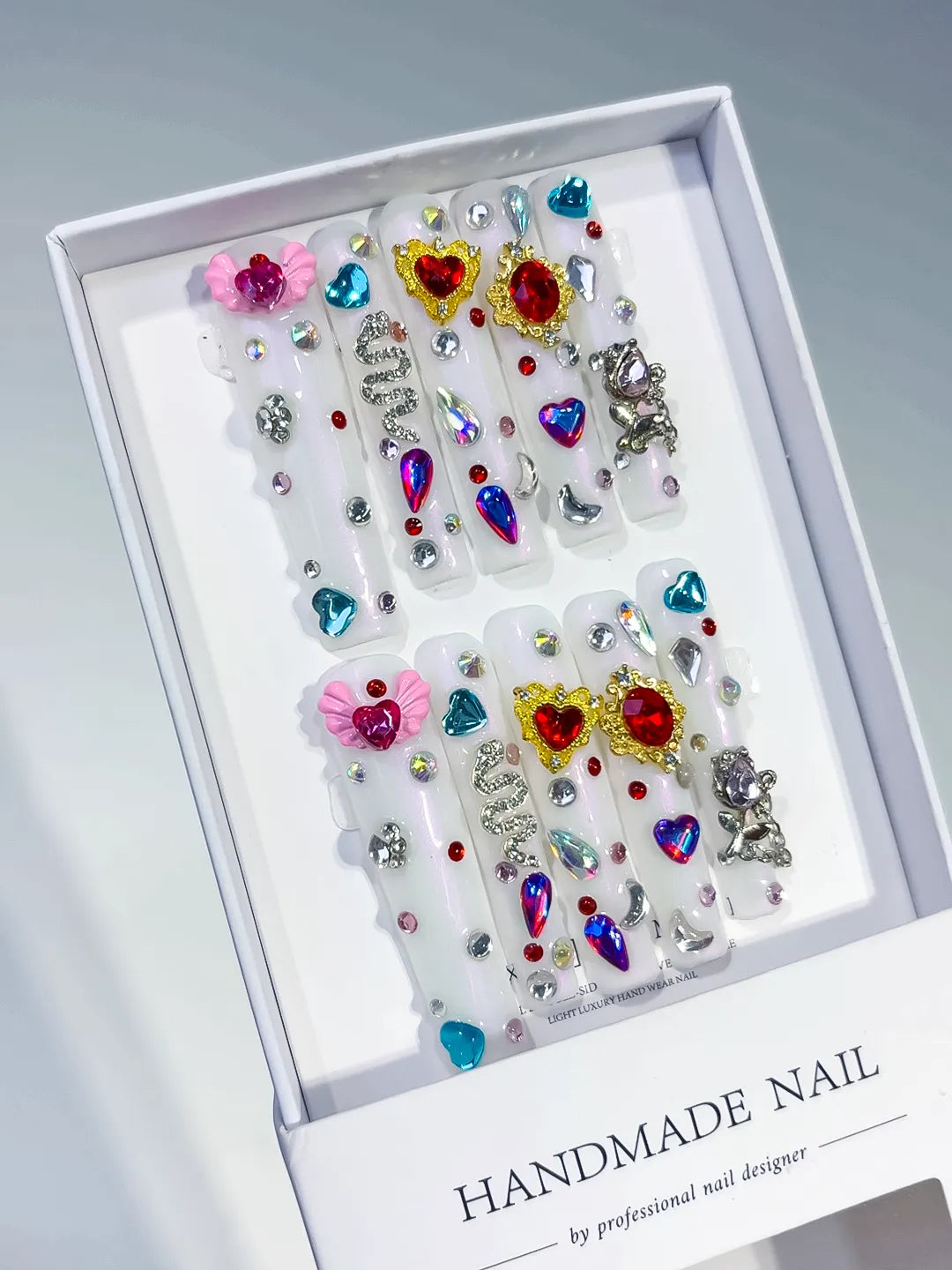 White Multicolor Silver Abstract Flower Rhinestone 3D press on nails angled view