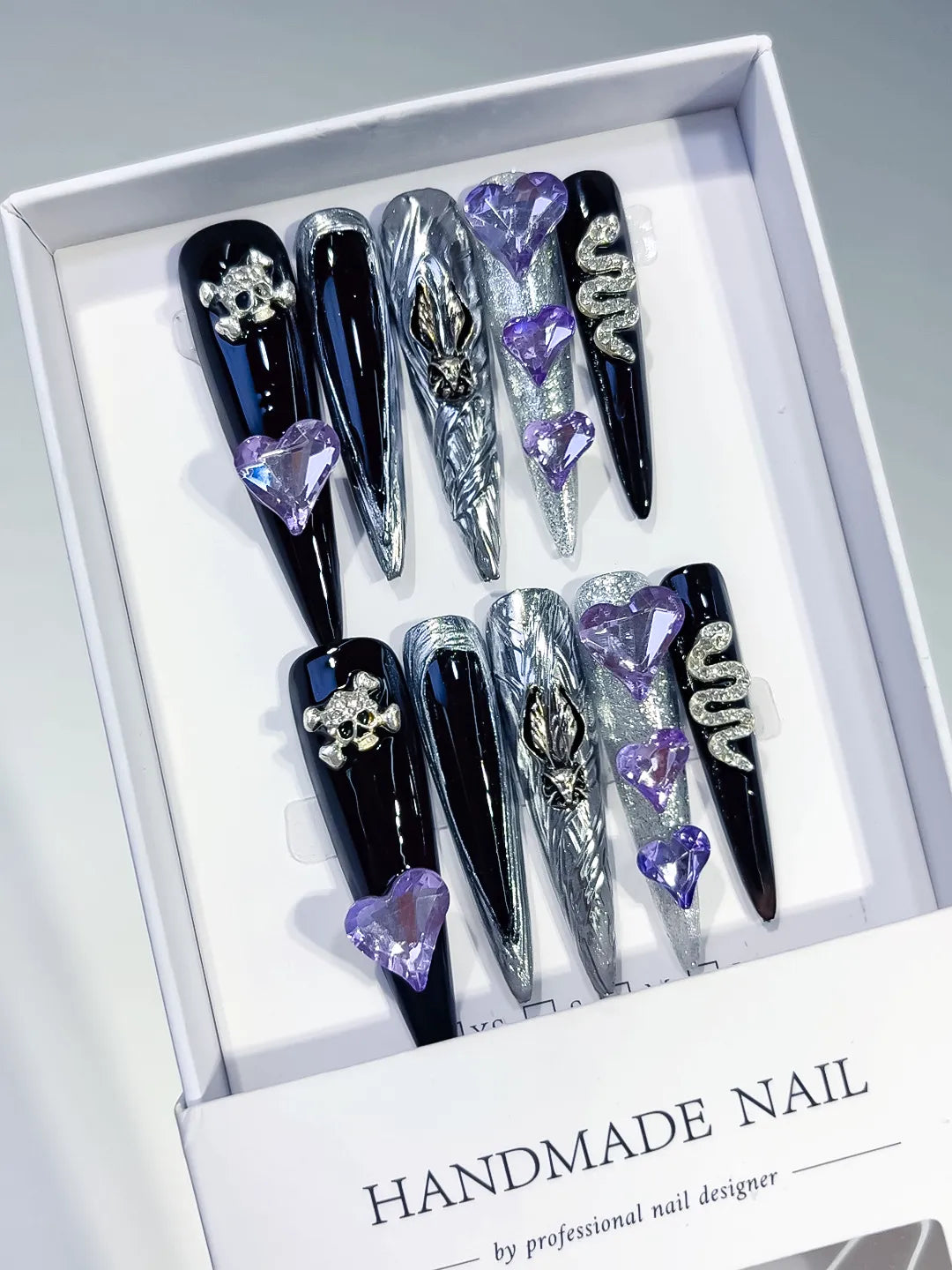 Black Silver White Abstract Swirl Rhinestone press on nails angled view