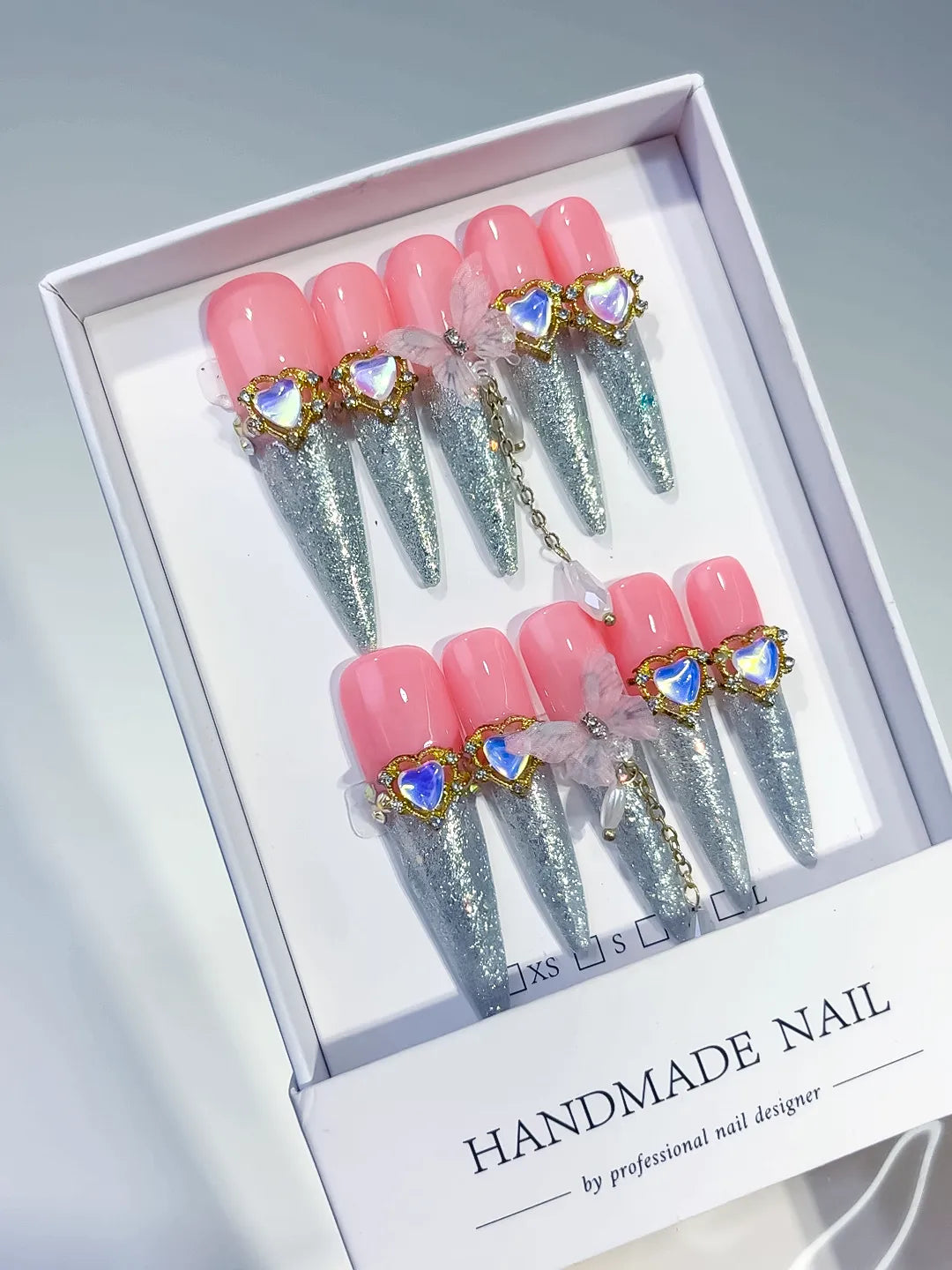 Pink Silver Solid color Rhinestone Metallic Accent press on nails angled view