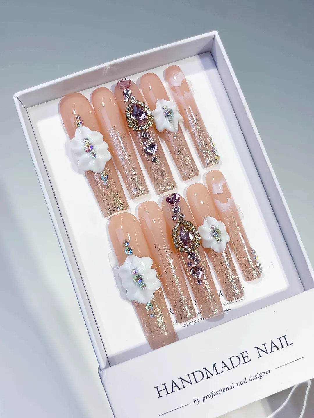 Nude White Silver Solid color Flower Rhinestone 3D press on nails angled view