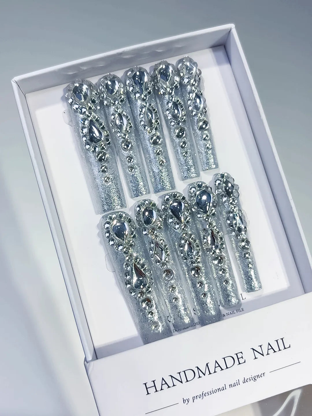 Silver Solid color Rhinestone Crystal Cluster press on nails angled view