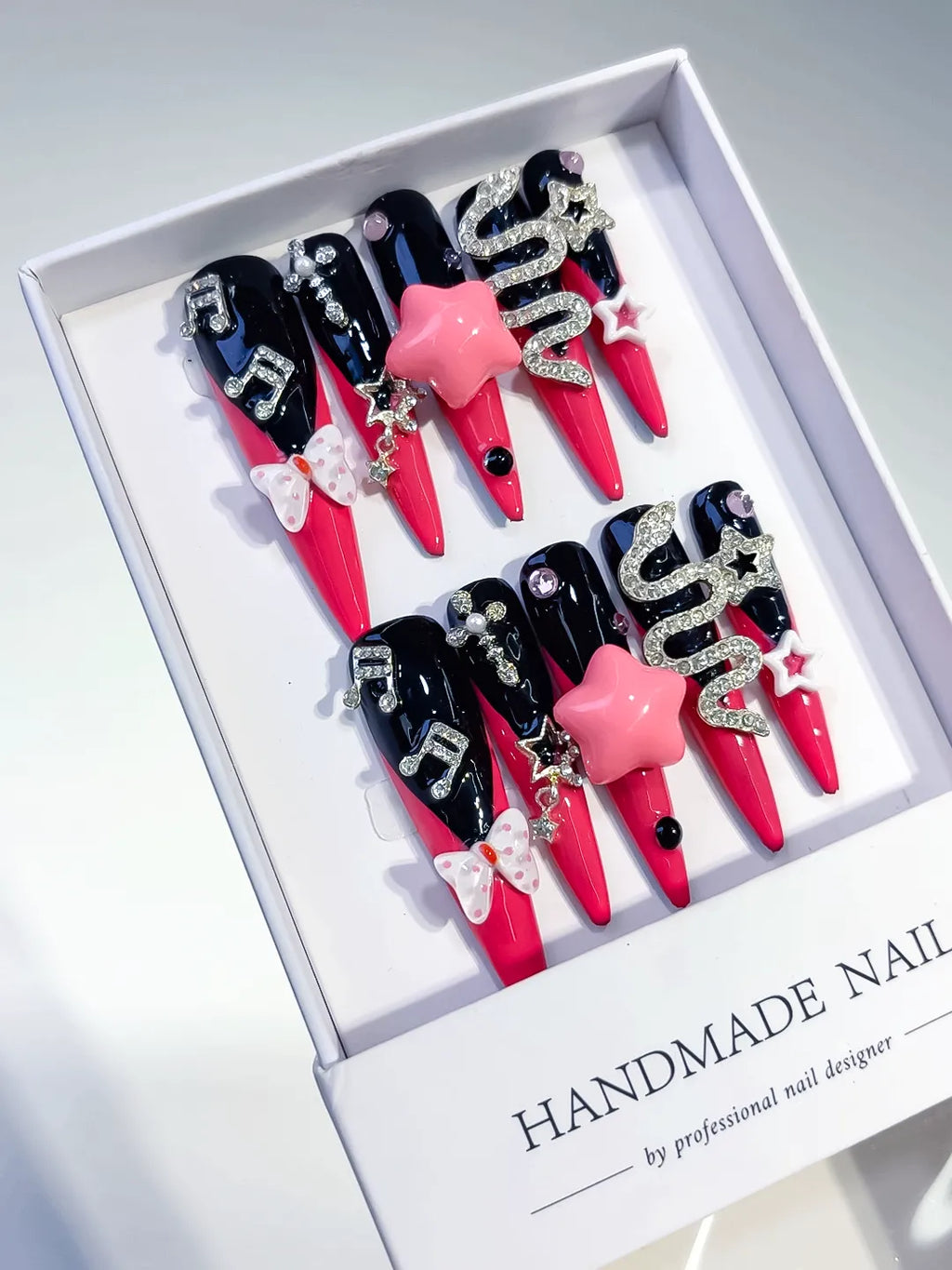 Pink Black Silver Abstract Bow Rhinestone 3D press on nails angled view