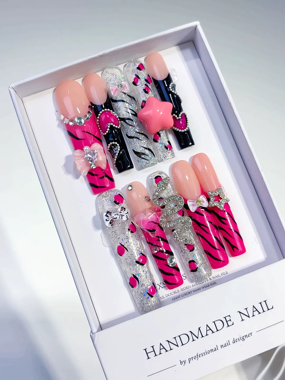 Pink Black White Silver Abstract Flower Bow Rhinestone 3D press on nails angled view