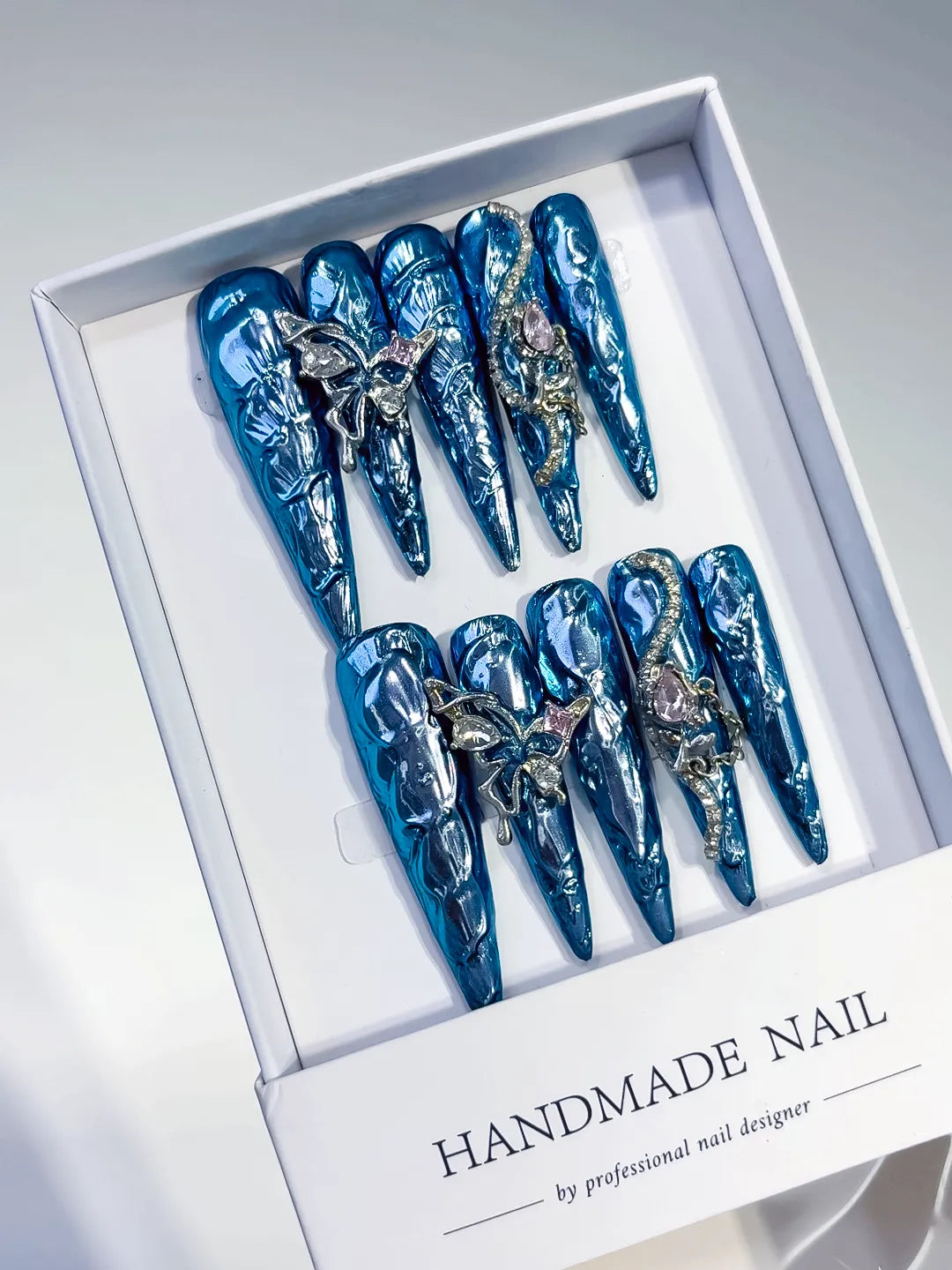 Blue Silver Glitter Rhinestone press on nails angled view