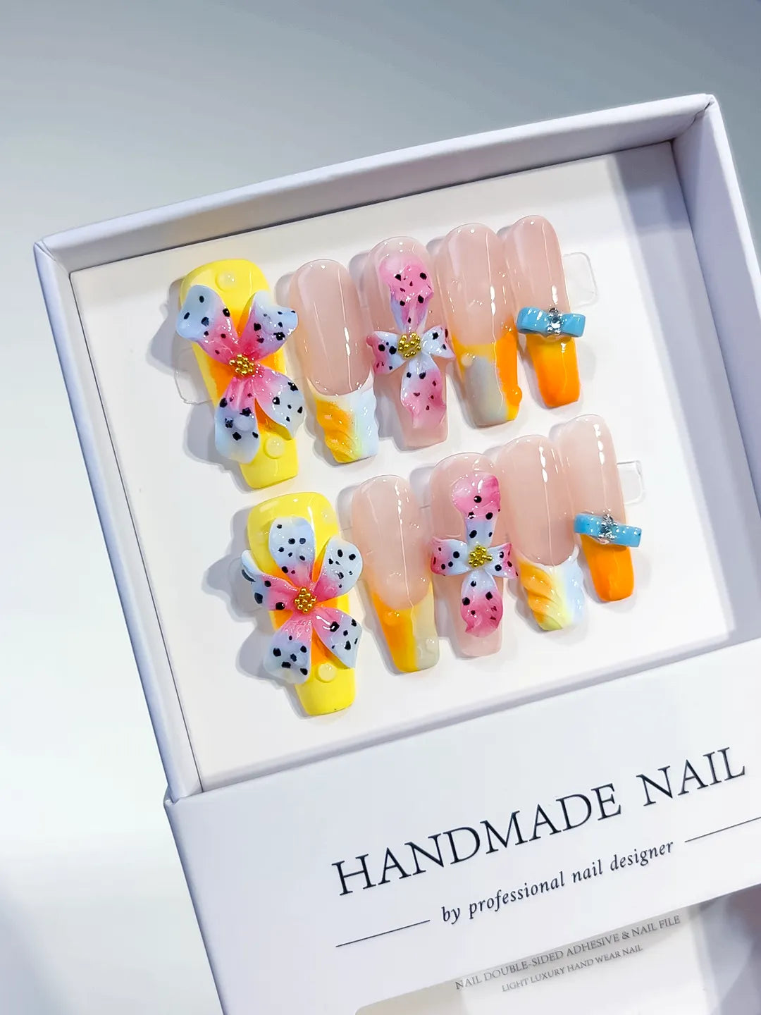 Pink Yellow Blue White Abstract Flower 3D press on nails angled view